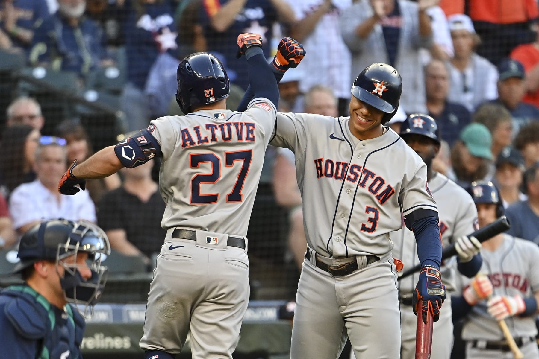 SEATTLE, WASHINGTON - JULY 22: Jose Altuve #27 of the Houston Astros celebrates with Jeremy Pena #3 after hitting a solo home run during the first inning against the Seattle Mariners at T-Mobile Park on July 22, 2022 in Seattle, Washington. (Photo by Alika Jenner/Getty Images)