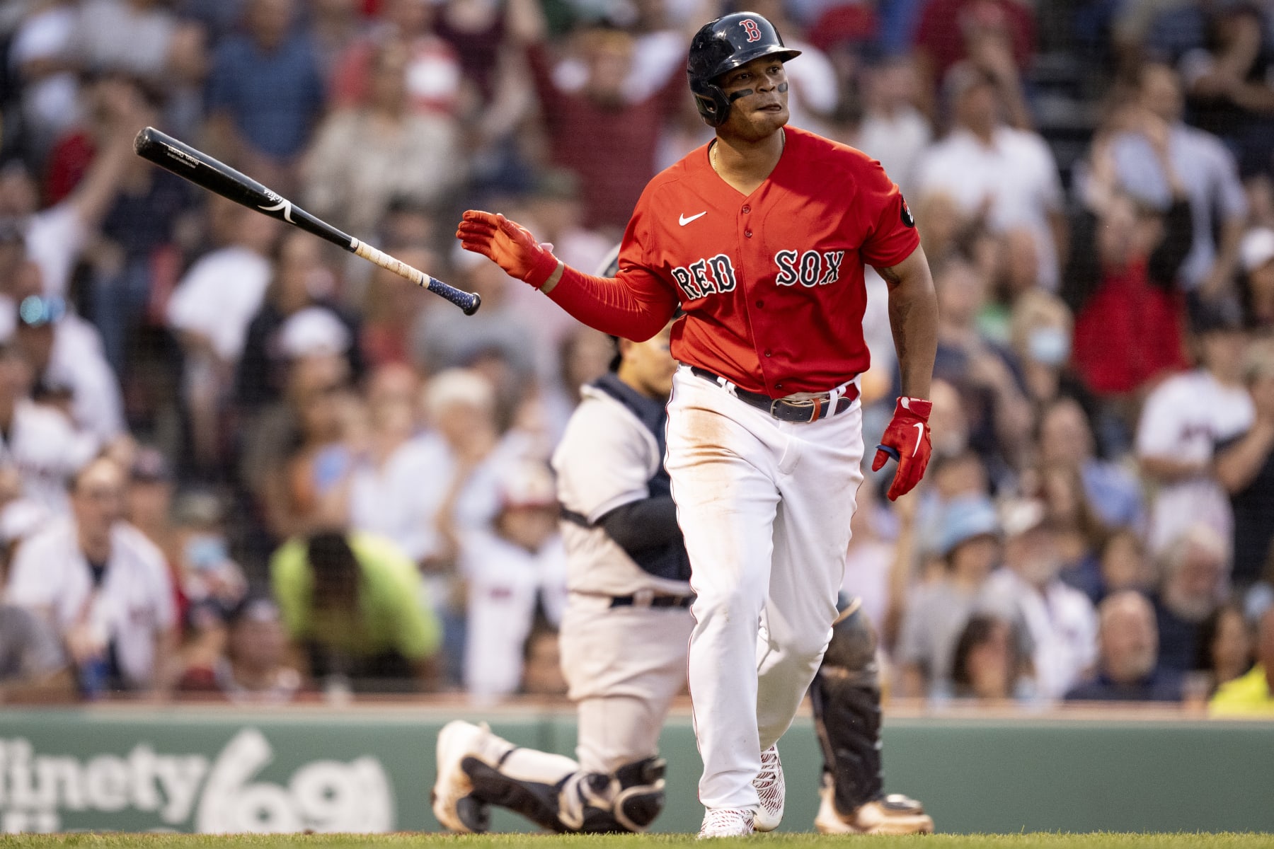 BOSTON, MA - JULY 7: Rafael Devers #11 of the Boston Red Sox tosses his bat after hitting a two-run home run during the third inning of a game against the New York Yankees on July 7, 2022 at Fenway Park  in Boston, Massachusetts. (Photo by Maddie Malhotra/Boston Red Sox/Getty Images)