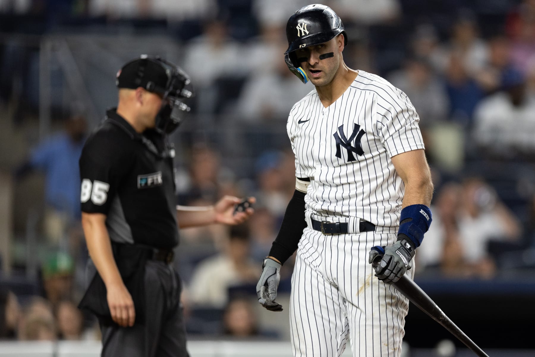 NEW YORK, NEW YORK - JUNE 28: Joey Gallo #13 of the New York Yankees reacts after striking out during the eighth inning of the game against the Oakland Athletics at Yankee Stadium on June 28, 2022 in New York City. (Photo by Dustin Satloff/Getty Images)