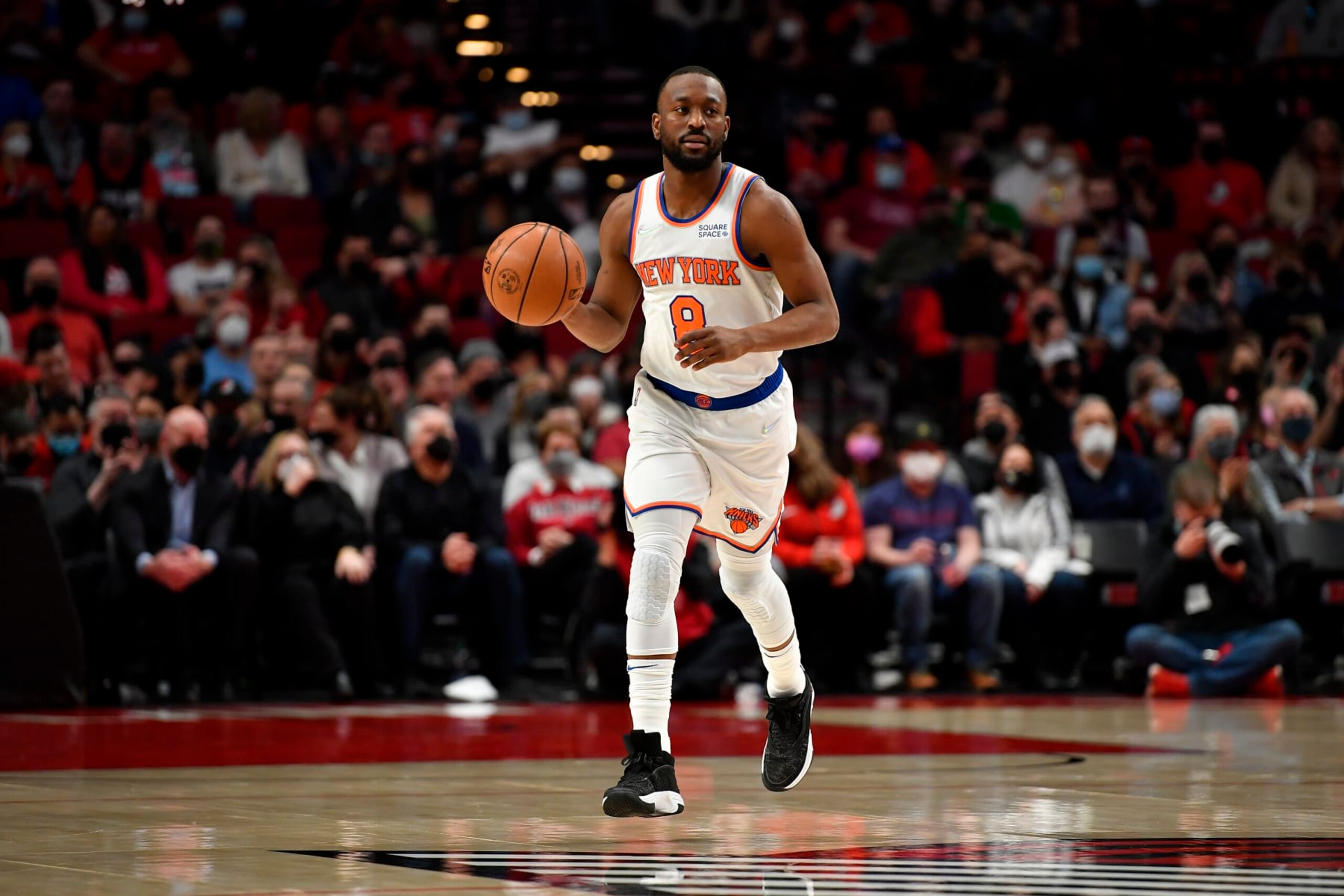 PORTLAND, OREGON - FEBRUARY 12: Kemba Walker #8 of the New York Knicks brings the ball up court during the first quarter against the Portland Trail Blazers at the Moda Center on February 12, 2022 in Portland, Oregon. NOTE TO USER: User expressly acknowledges and agrees that, by downloading and or using this photograph, User is consenting to the terms and conditions of the Getty Images License Agreement. (Photo by Alika Jenner/Getty Images)