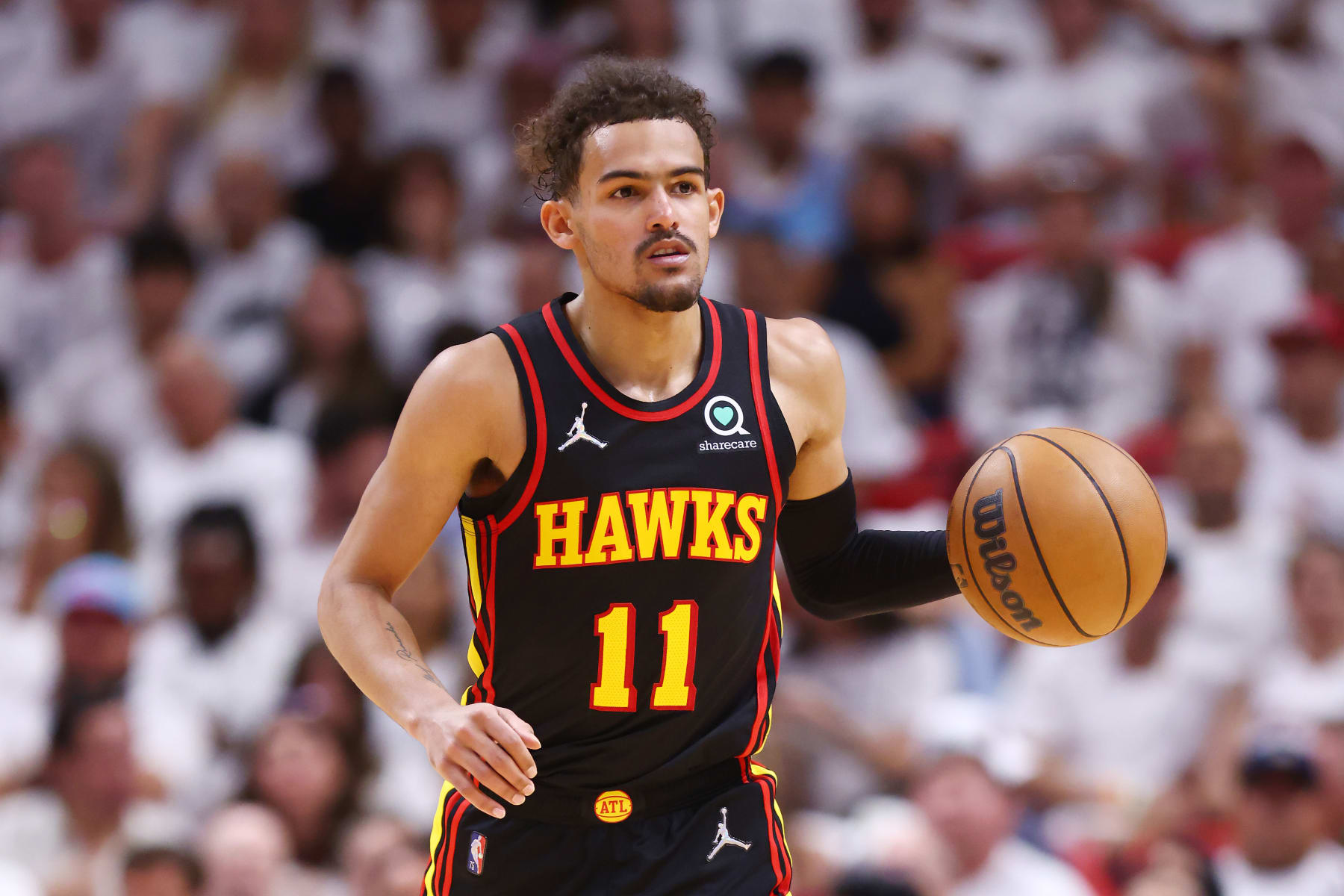 MIAMI, FLORIDA - APRIL 19: Trae Young #11 of the Atlanta Hawks in action against the Miami Heat during the second quarter in Game Two of the Eastern Conference First Round at FTX Arena on April 19, 2022 in Miami, Florida. NOTE TO USER: User expressly acknowledges and agrees that, by downloading and or using this photograph, User is consenting to the terms and conditions of the Getty Images License Agreement.  (Photo by Michael Reaves/Getty Images)