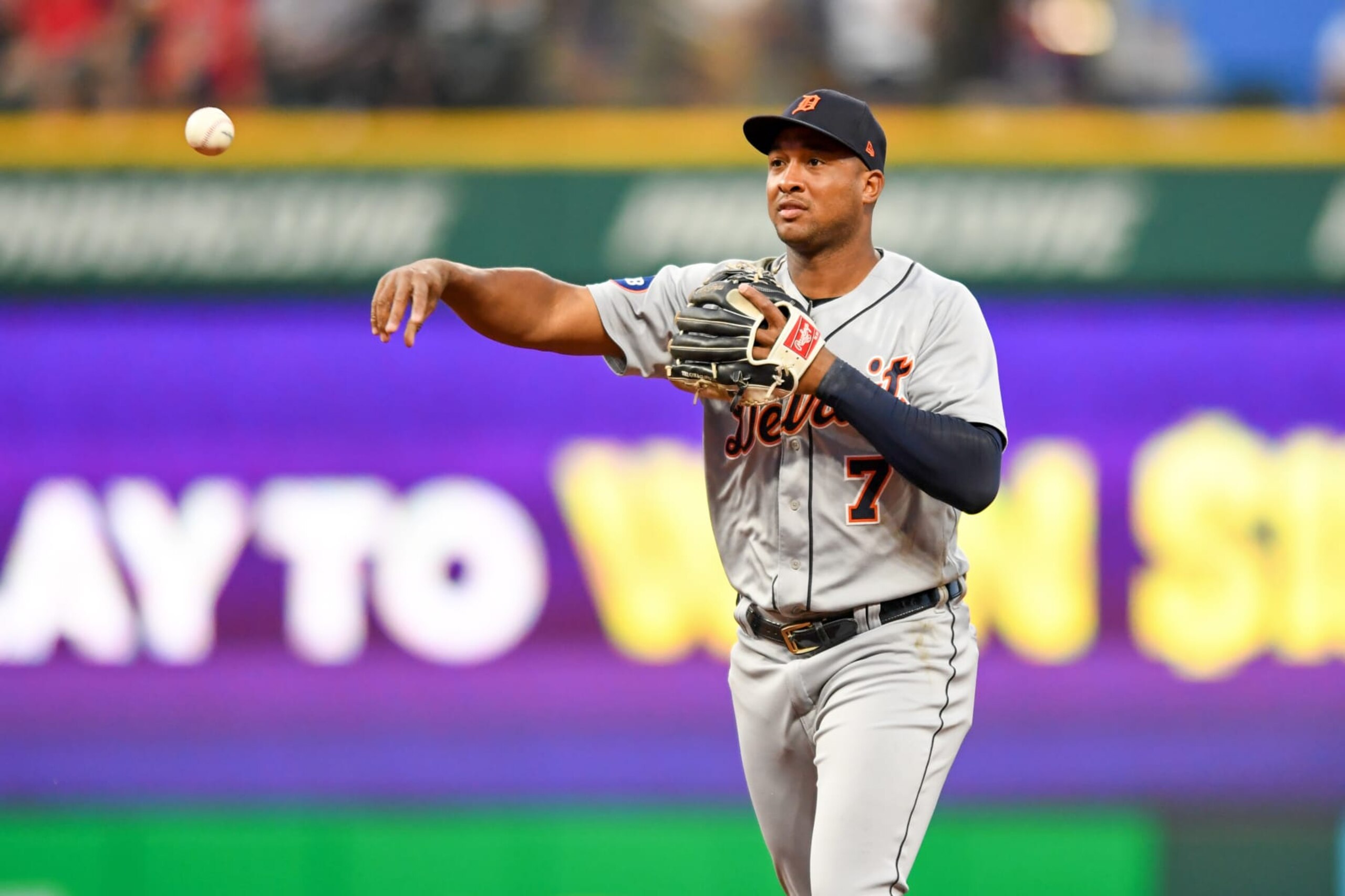 CLEVELAND, OH - JULY 14: Jonathan Schoop #7 of the Detroit Tigers throws out Steven Kwan of the Cleveland Guardians at first base during the sixth inning at Progressive Field on July 14, 2022 in Cleveland, Ohio. (Photo by Nick Cammett/Diamond Images via Getty Images)