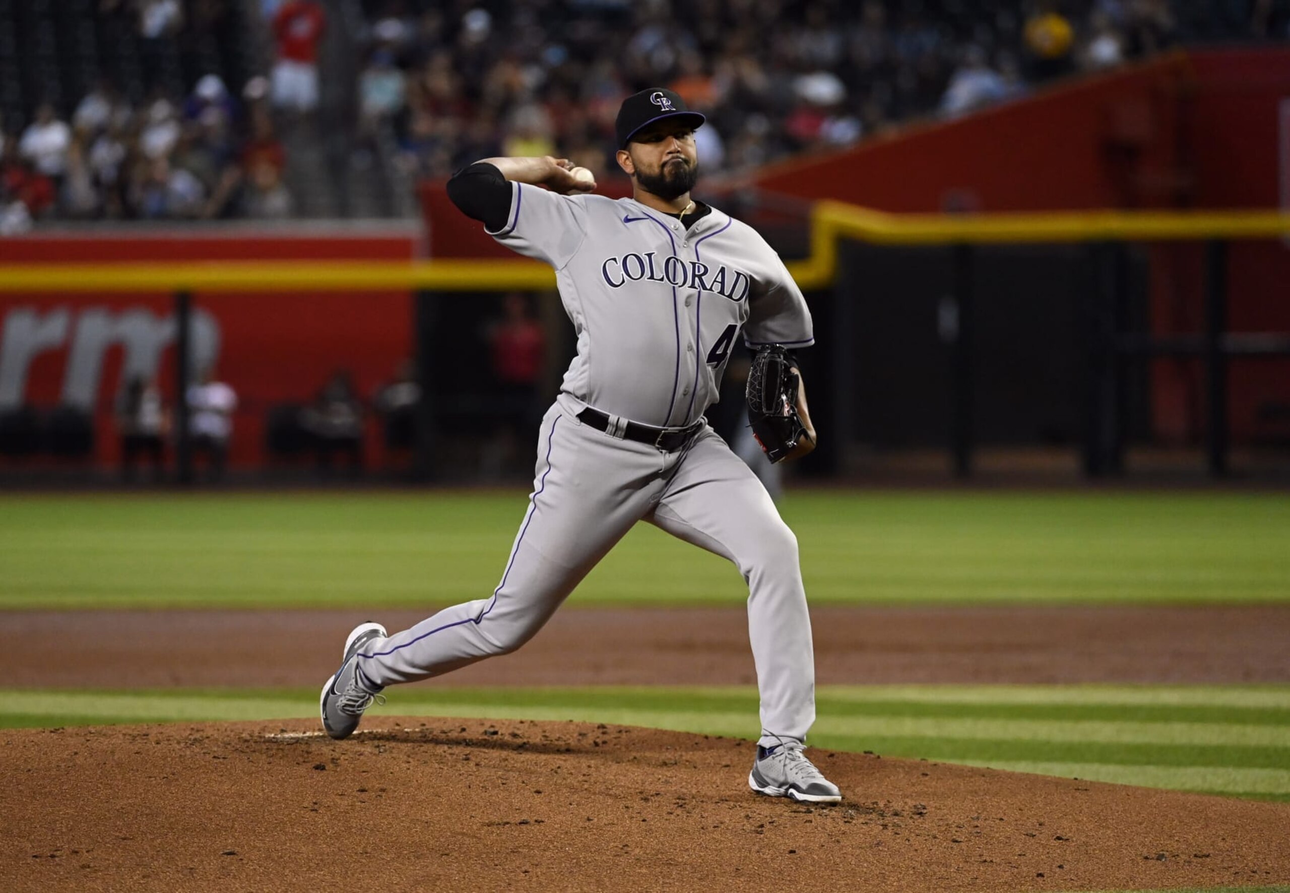 PHOENIX, ARIZONA - JULY 10: German Marquez #48 of the Colorado Rockies delivers a pitch against the Arizona Diamondbacks at Chase Field on July 10, 2022 in Phoenix, Arizona. (Photo by Norm Hall/Getty Images)