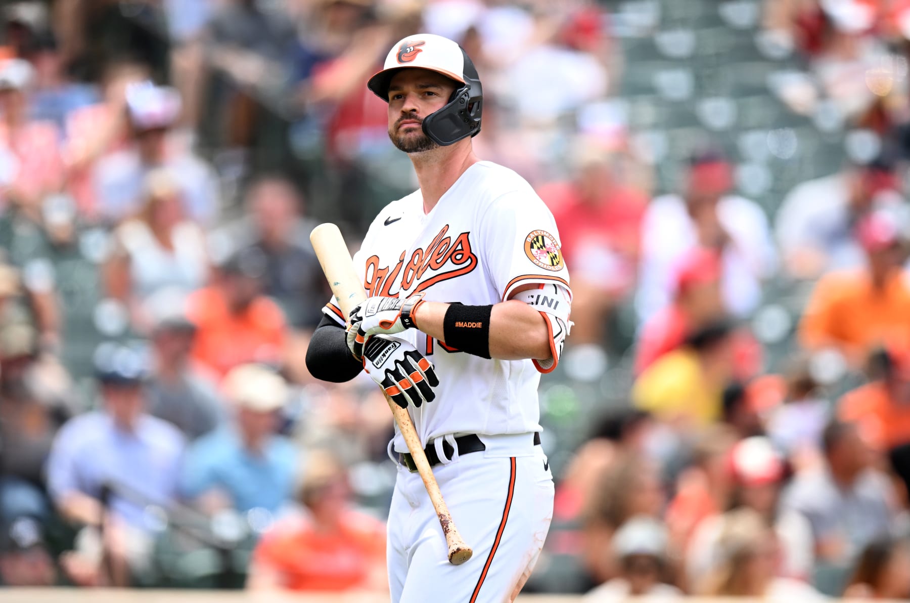 BALTIMORE, MARYLAND - JULY 10: Trey Mancini #16 of the Baltimore Orioles walks to the dugout after making an out against the Los Angeles Angels at Oriole Park at Camden Yards on July 10, 2022 in Baltimore, Maryland. (Photo by G Fiume/Getty Images)