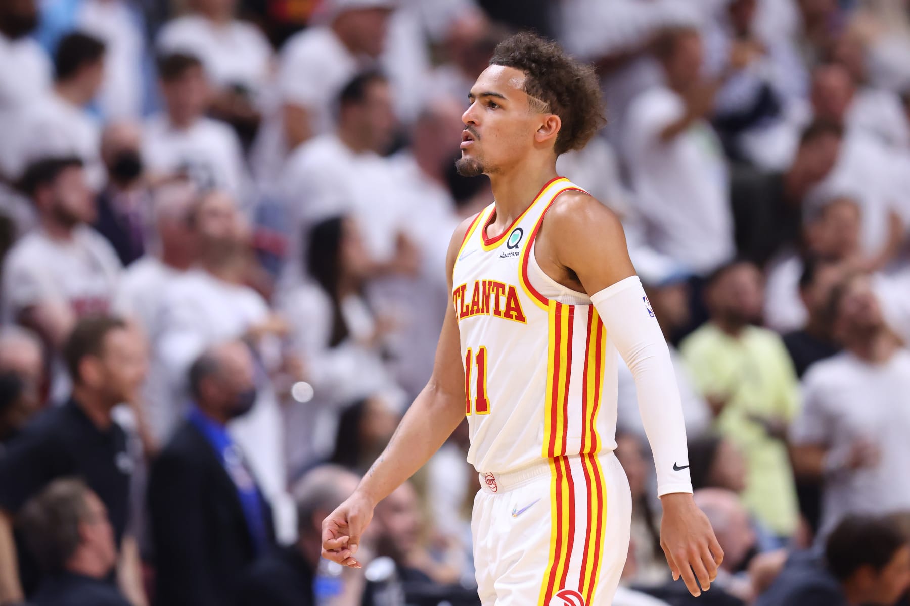 MIAMI, FLORIDA - APRIL 26: Trae Young #11 of the Atlanta Hawks reacts against the Miami Heat in Game Five of the Eastern Conference First Round at FTX Arena on April 26, 2022 in Miami, Florida. NOTE TO USER: User expressly acknowledges and agrees that, by downloading and or using this photograph, User is consenting to the terms and conditions of the Getty Images License Agreement.  (Photo by Michael Reaves/Getty Images)