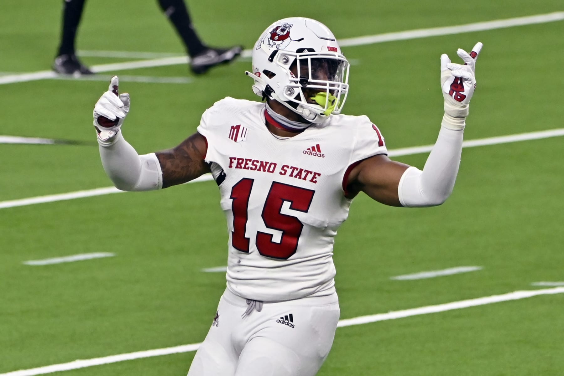 LAS VEGAS, NEVADA - NOVEMBER 07:  Arron Mosby #15 of the Fresno State Bulldogs reacts after a play against the UNLV Rebels during the second half of their game at Allegiant Stadium on November 07, 2020 in Las Vegas, Nevada. Fresno State won 40-27.  (Photo by David Becker/Getty Images)
