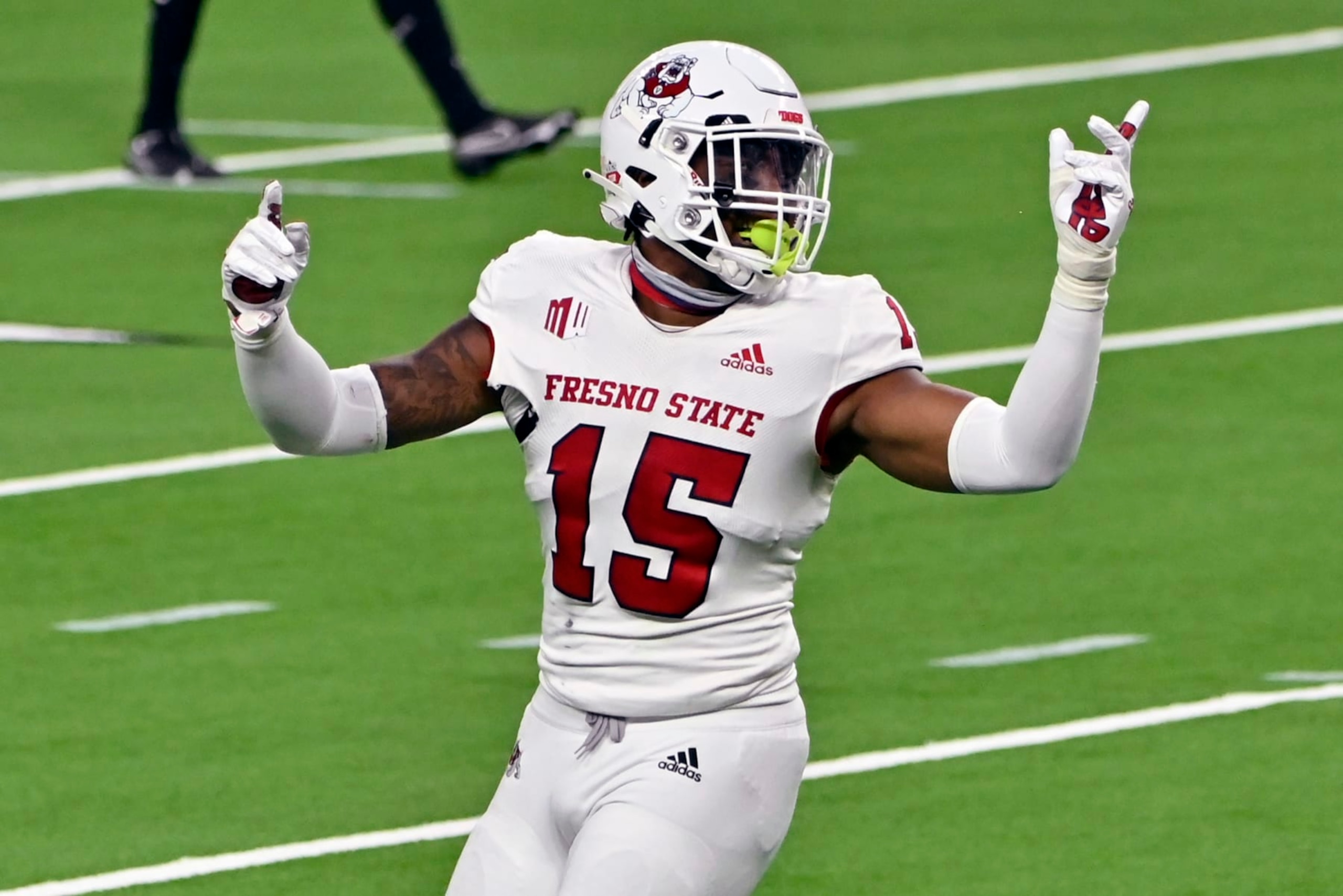 LAS VEGAS, NEVADA - NOVEMBER 07:  Arron Mosby #15 of the Fresno State Bulldogs reacts after a play against the UNLV Rebels during the second half of their game at Allegiant Stadium on November 07, 2020 in Las Vegas, Nevada. Fresno State won 40-27.  (Photo by David Becker/Getty Images)