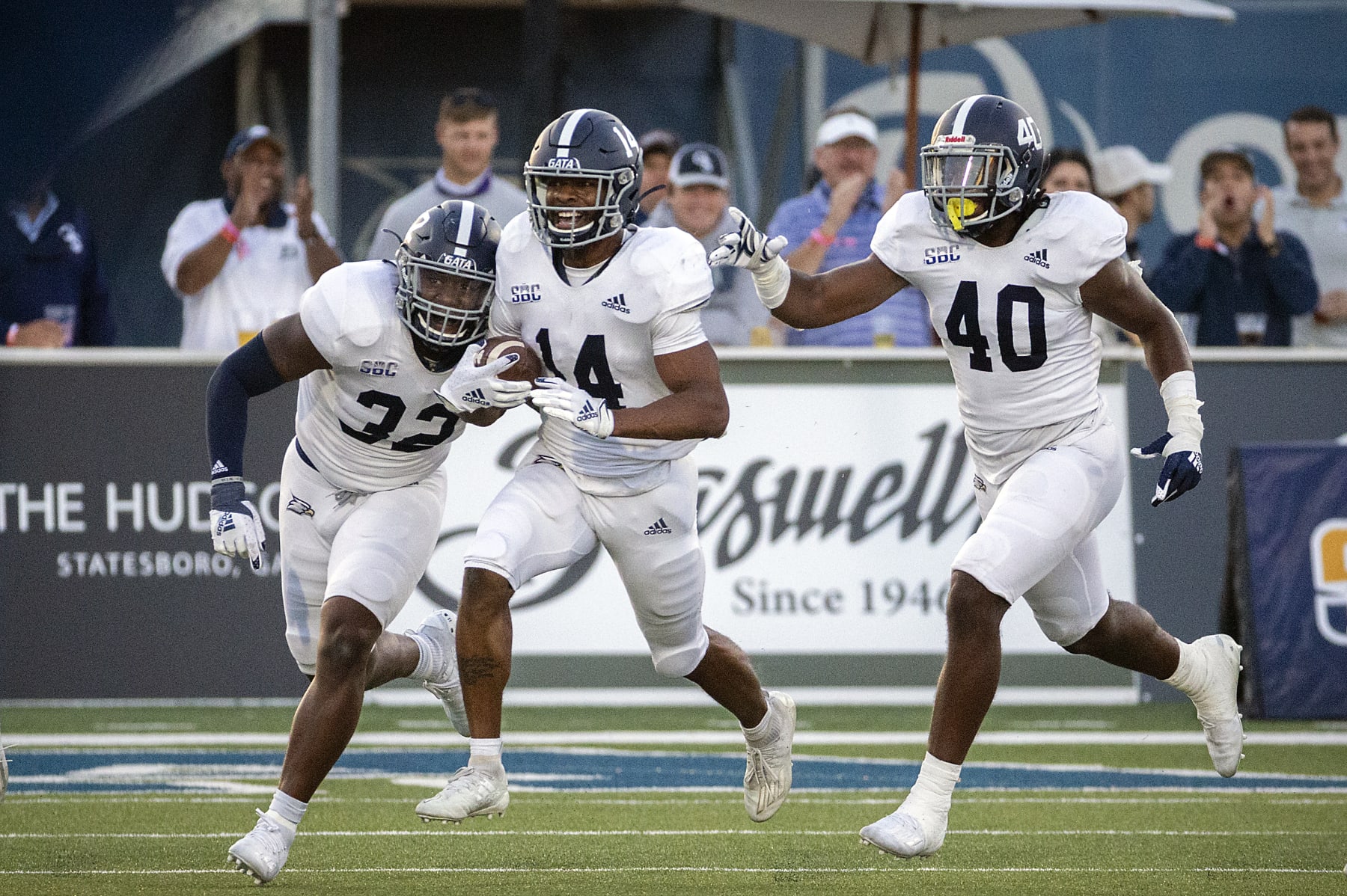 Georgia Southern cornerback Darrell Baker Jr. (14) celebrates after intercepting a pass during the second half of an NCAA football game against Massachusetts, Saturday, Oct. 17, 2020, in Statesboro, Ga. (AP Photo/Stephen B. Morton)