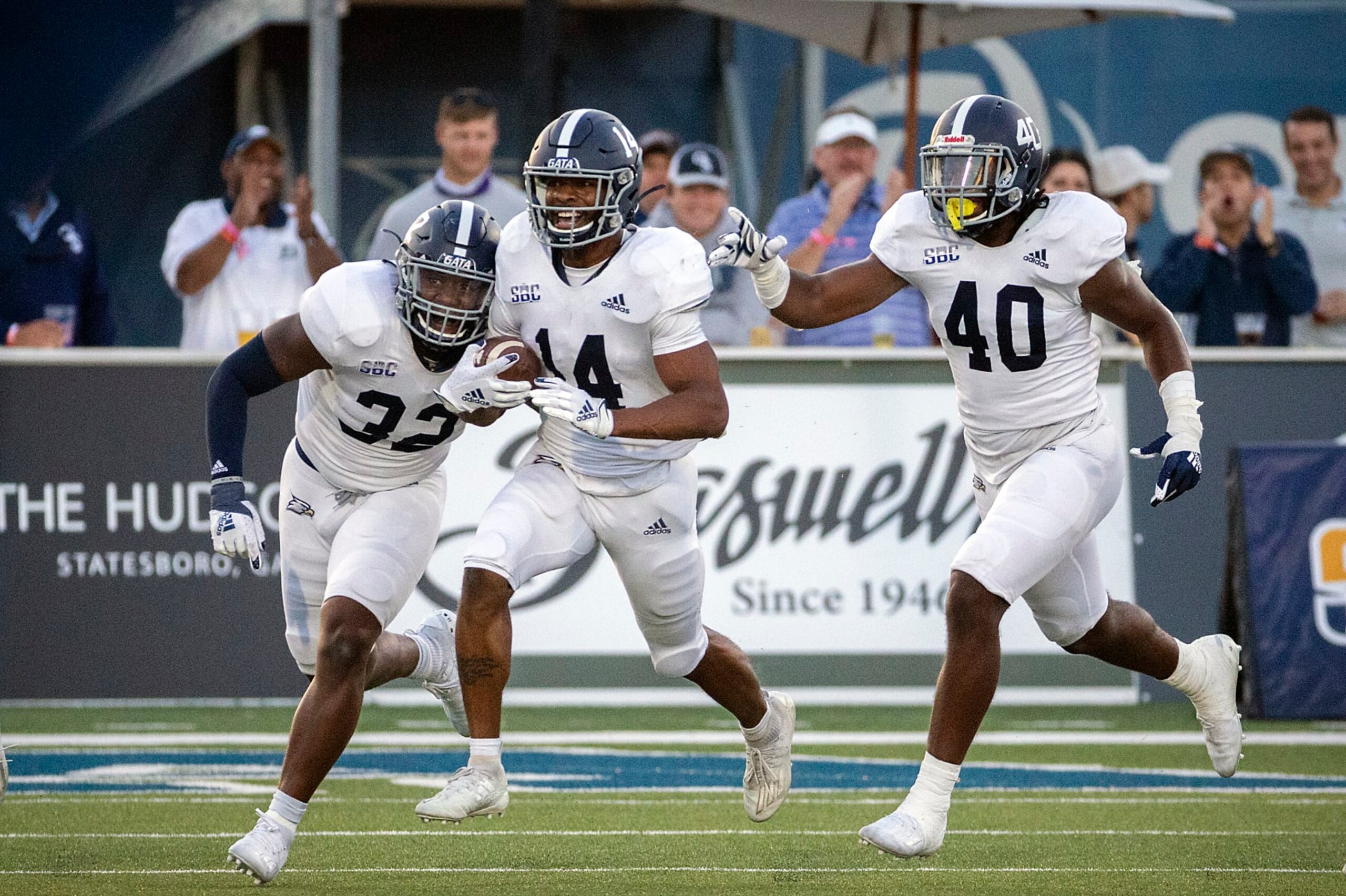 Georgia Southern cornerback Darrell Baker Jr. (14) celebrates after intercepting a pass during the second half of an NCAA football game against Massachusetts, Saturday, Oct. 17, 2020, in Statesboro, Ga. (AP Photo/Stephen B. Morton)