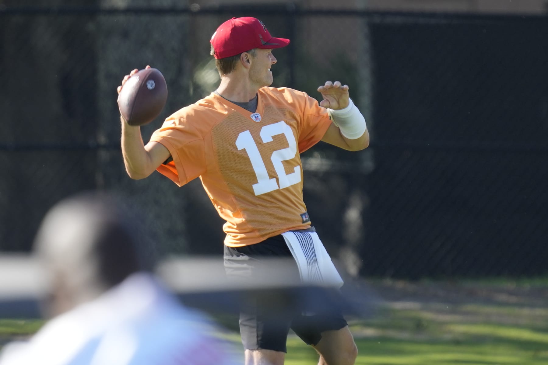 Tampa Bay Buccaneers quarterback Tom Brady throws a pass during an NFL football minicamp Wednesday, June 8, 2022, in Tampa, Fla. (AP Photo/Chris O'Meara)