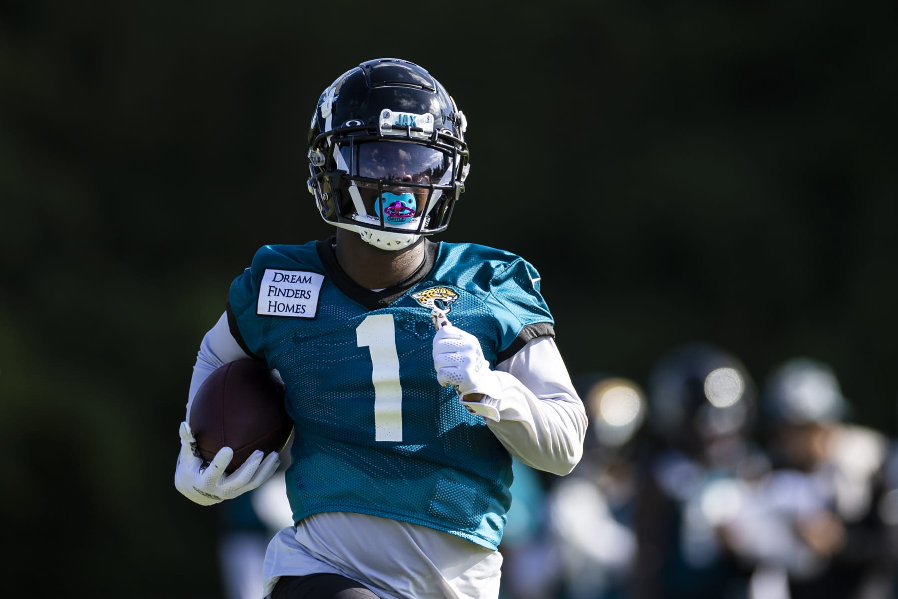 JACKSONVILLE, FLORIDA - JULY 25: Travis Etienne Jr. #1 of the Jacksonville Jaguars runs during Training camp on July 25, 2022 at Episcopal High School in Jacksonville, Florida. (Photo by James Gilbert/Getty Images)