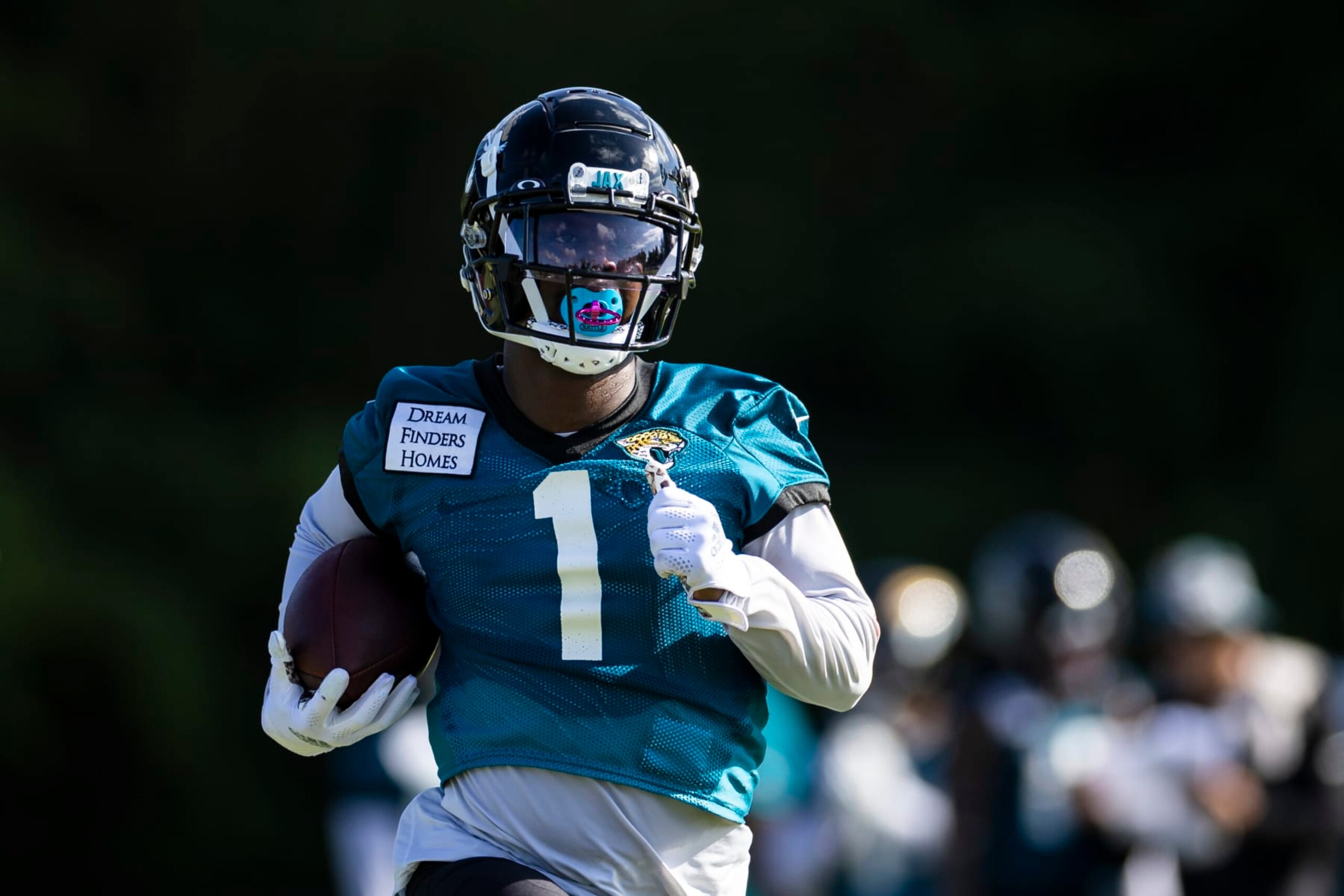 JACKSONVILLE, FLORIDA - JULY 25: Travis Etienne Jr. #1 of the Jacksonville Jaguars runs during Training camp on July 25, 2022 at Episcopal High School in Jacksonville, Florida. (Photo by James Gilbert/Getty Images)