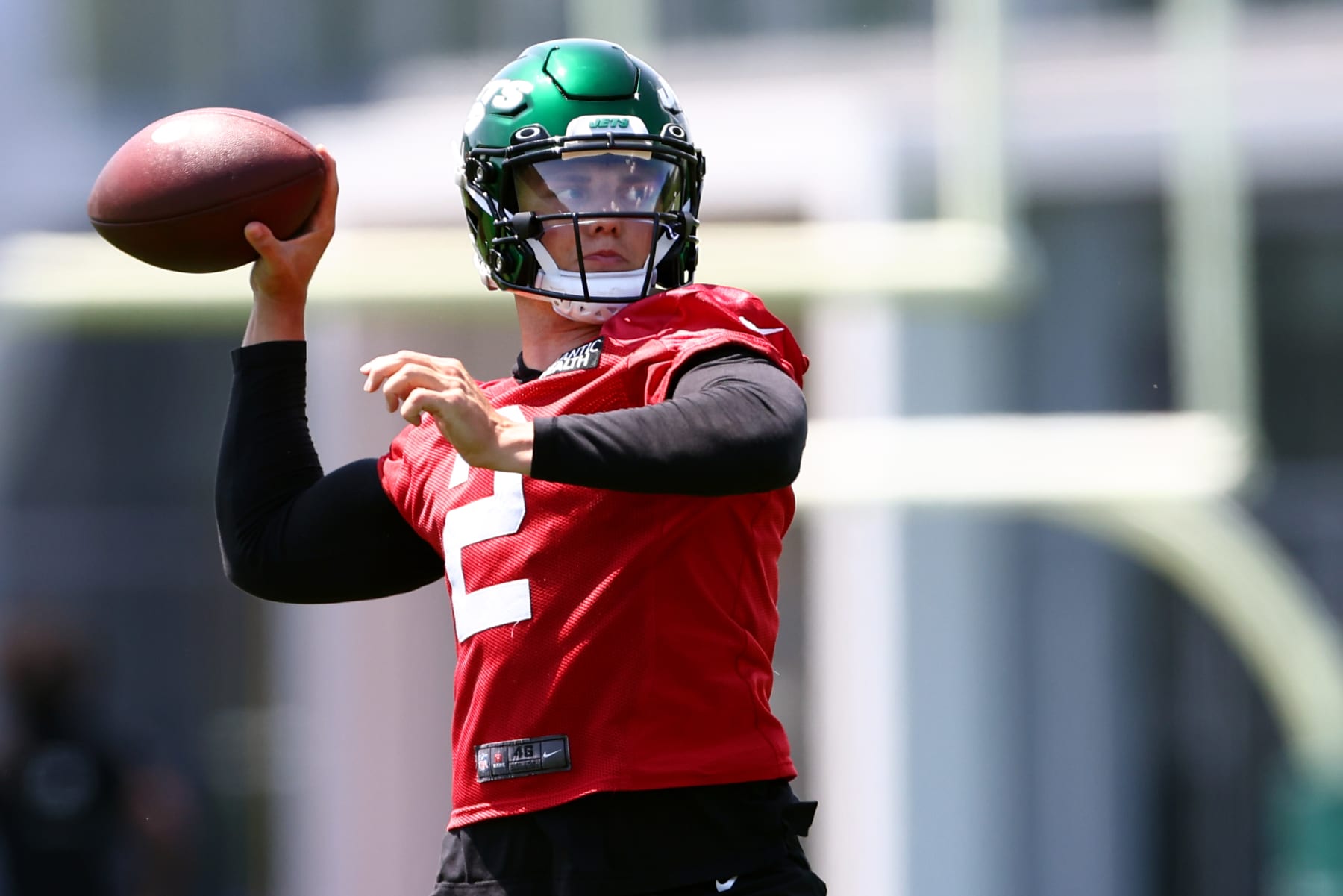 FLORHAM PARK, NJ - JUNE 15: Quarterback Zach Wilson #2 of the New York Jets throws a pass during New York Jets mandatory minicamp at Atlantic Health Jets Training Center on June 15, 2022 in Florham Park, New Jersey. (Photo by Rich Schultz/Getty Images)