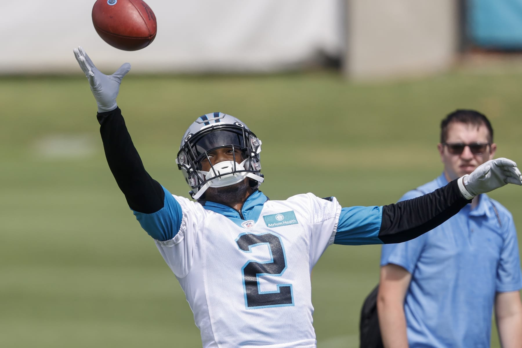 Carolina Panthers wide receiver DJ Moore catches a pass during NFL football practice in Charlotte, N.C., Wednesday, June 8, 2022. (AP Photo/Nell Redmond)