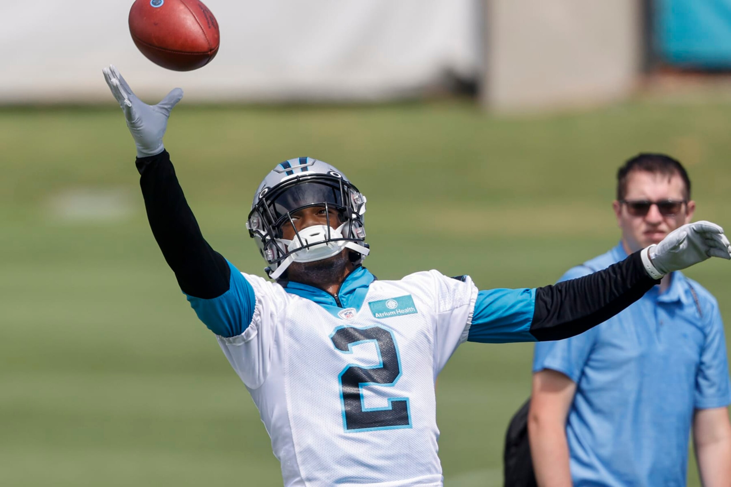 Carolina Panthers wide receiver DJ Moore catches a pass during NFL football practice in Charlotte, N.C., Wednesday, June 8, 2022. (AP Photo/Nell Redmond)