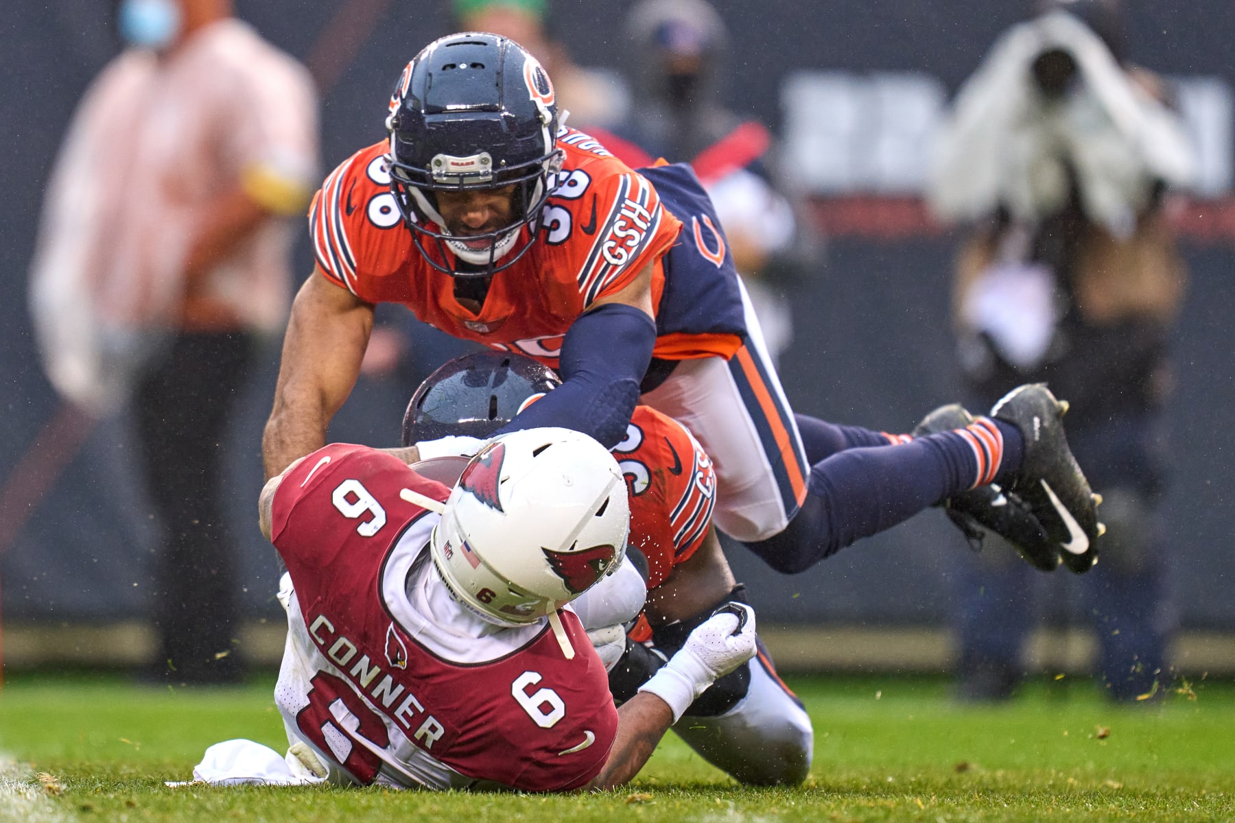 CHICAGO, IL - DECEMBER 05: Arizona Cardinals running back James Conner (6) battles with Chicago Bears inside linebacker Roquan Smith (58) and safety Tashaun Gipson (38) during a game between the Arizona Cardinals and the Chicago Bears on December 5, 2021 at Soldier Stadium, in Chicago, IL. (Photo by Robin Alam/Icon Sportswire via Getty Images)