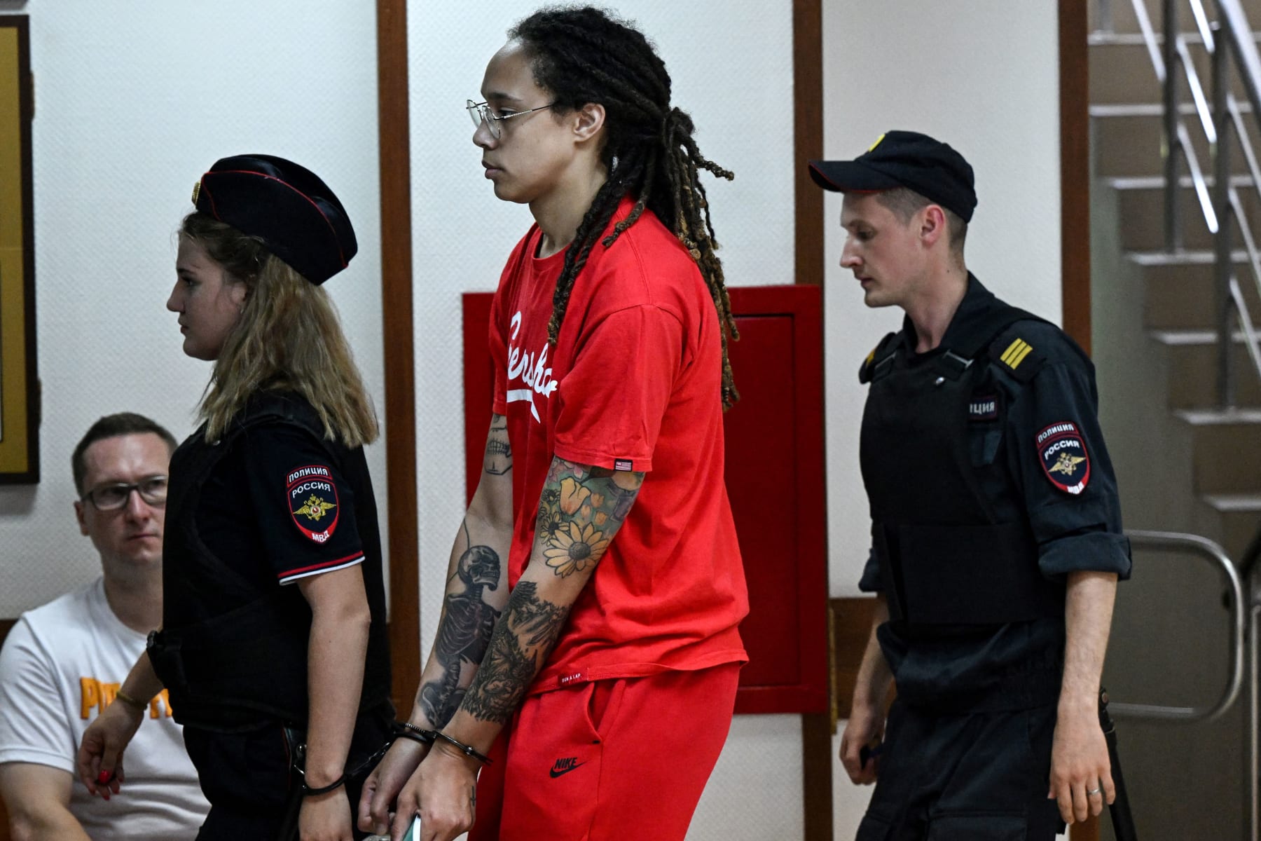 US WNBA basketball superstar Brittney Griner arrives to a hearing at the Khimki Court, outside Moscow on July 7, 2022. - Griner, a two-time Olympic gold medallist and WNBA champion, was detained at Moscow airport in February on charges of carrying in her luggage vape cartridges with cannabis oil, which could carry a 10-year prison sentence. (Photo by Kirill KUDRYAVTSEV / AFP) (Photo by KIRILL KUDRYAVTSEV/AFP via Getty Images)