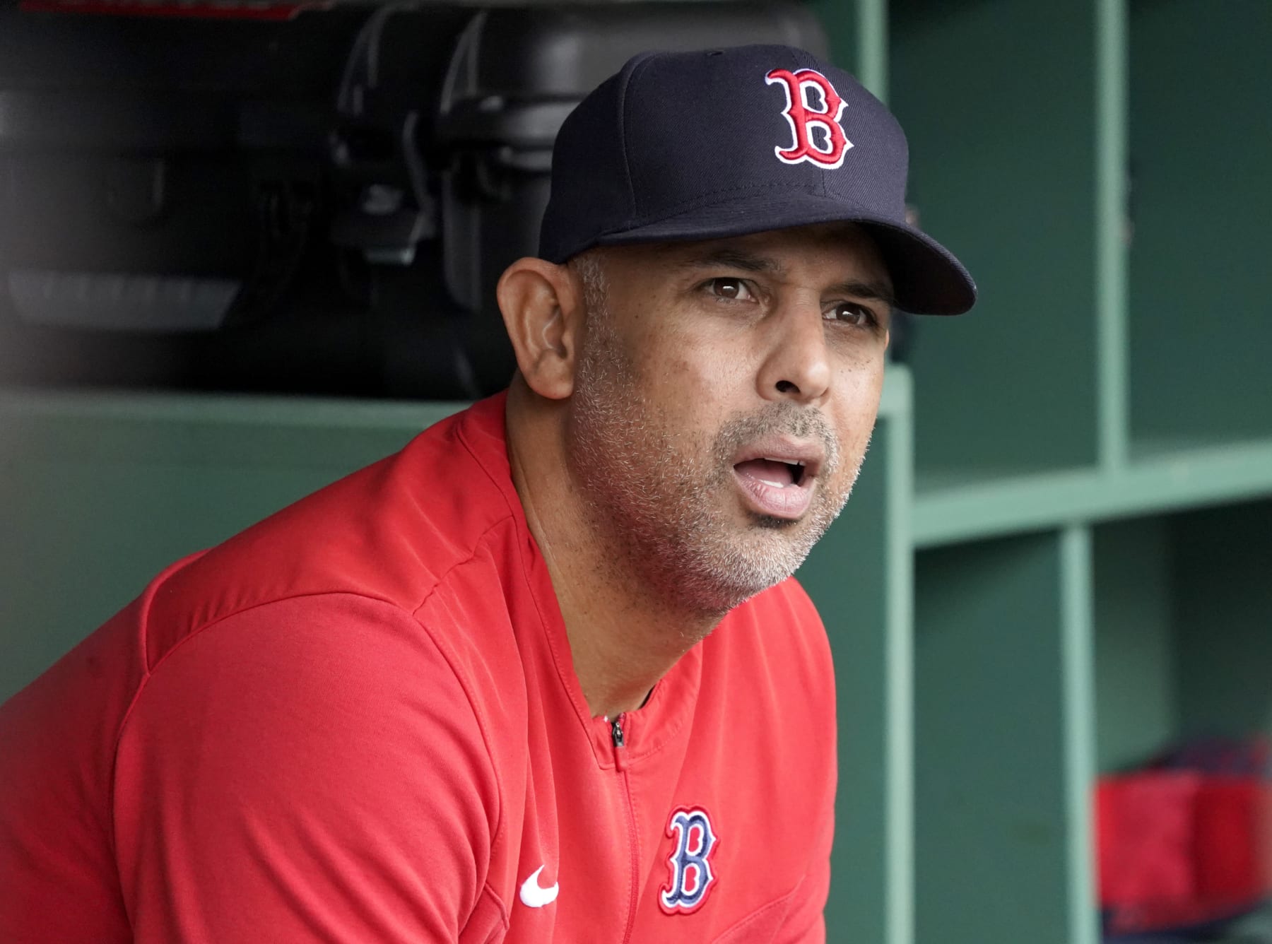 Boston Red Sox manager Alex Cora looks out from the dugout before the start of a baseball game against the Oakland Athletics at Fenway Park, Thursday, June 16, 2022, in Boston. (AP Photo/Mary Schwalm)