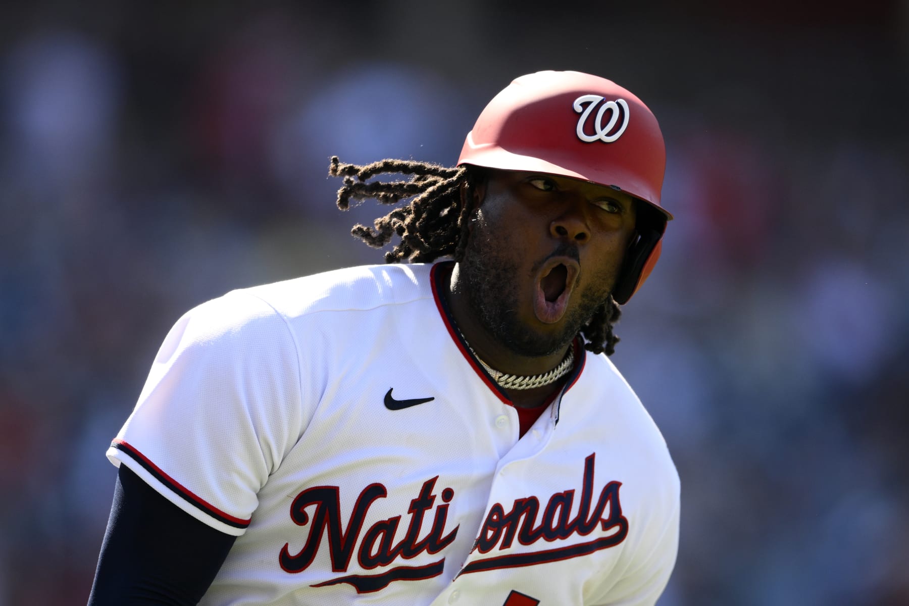 Washington Nationals' Josh Bell reacts after he hit a home run during the eighth inning of a baseball game against the Miami Marlins, Sunday, July 3, 2022, in Washington. (AP Photo/Nick Wass)