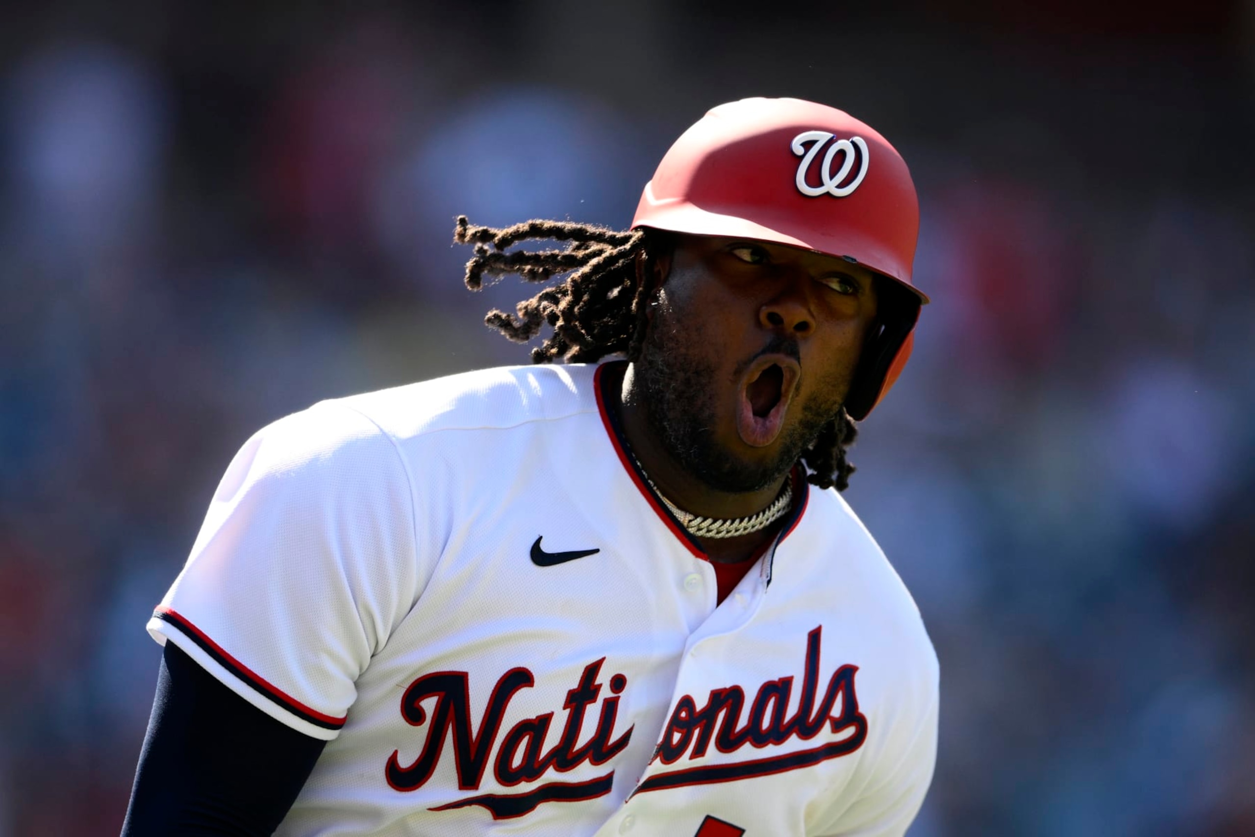 Washington Nationals' Josh Bell reacts after he hit a home run during the eighth inning of a baseball game against the Miami Marlins, Sunday, July 3, 2022, in Washington. (AP Photo/Nick Wass)