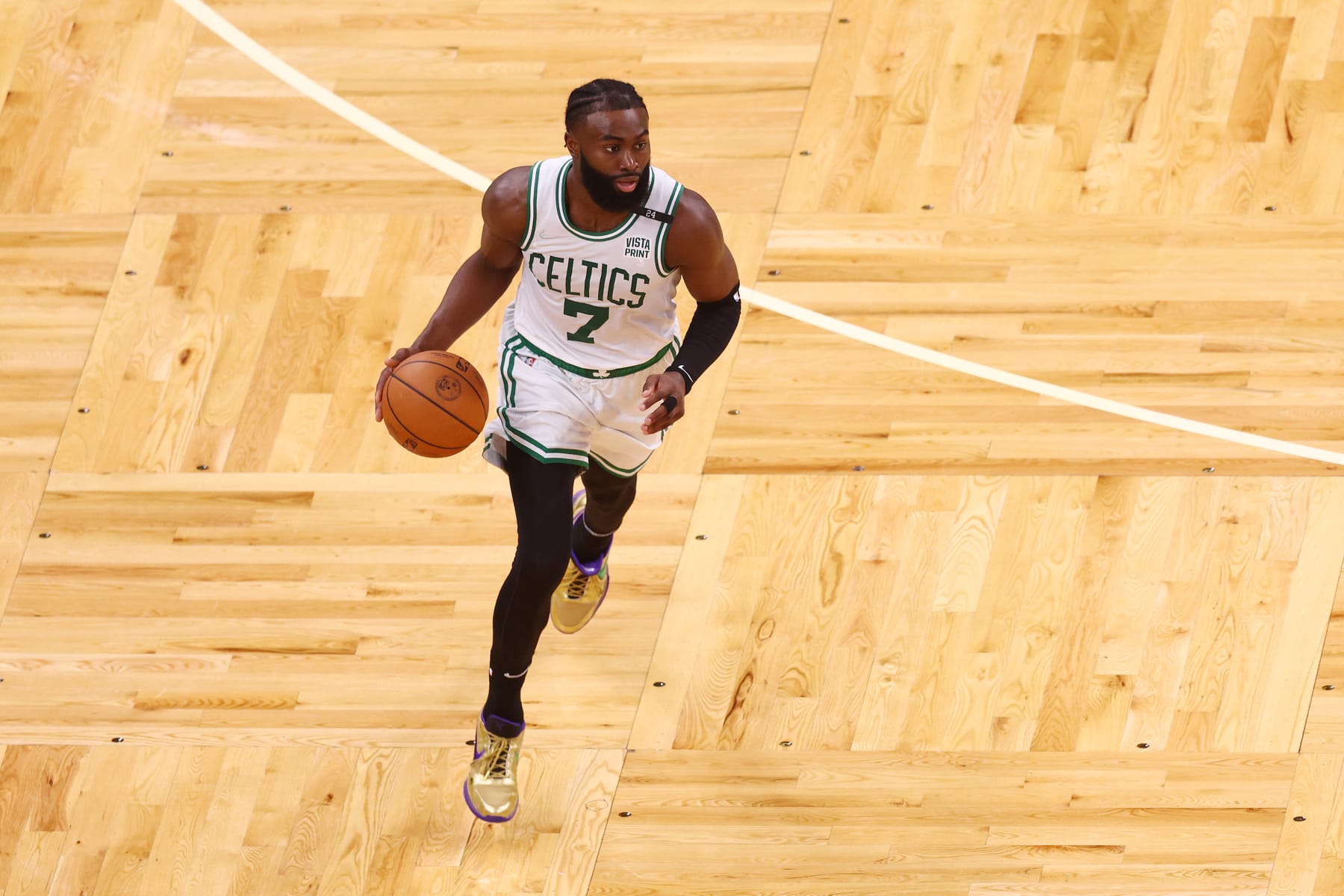 BOSTON, MASSACHUSETTS - JUNE 16: Jaylen Brown #7 of the Boston Celtics dribbles up the court against the Golden State Warriors during the third quarter in Game Six of the 2022 NBA Finals at TD Garden on June 16, 2022 in Boston, Massachusetts. NOTE TO USER: User expressly acknowledges and agrees that, by downloading and/or using this photograph, User is consenting to the terms and conditions of the Getty Images License Agreement. (Photo by Adam Glanzman/Getty Images)
