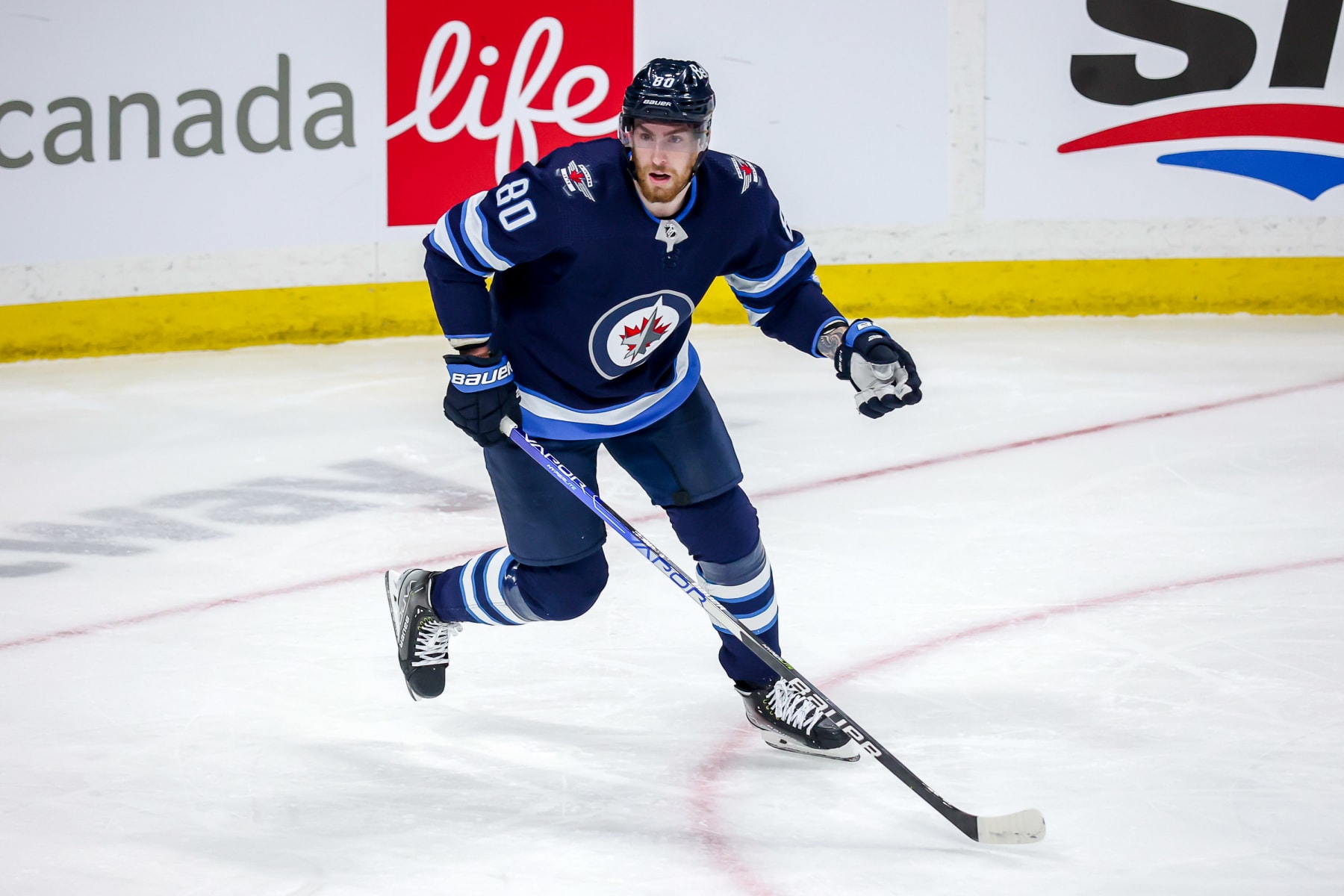 WINNIPEG, MB - APRIL 27: Pierre-Luc Dubois #80 of the Winnipeg Jets keeps an eye on the play during first period action against the Philadelphia Flyers at the Canada Life Centre on April 27, 2022 in Winnipeg, Manitoba, Canada. (Photo by Jonathan Kozub/NHLI via Getty Images)