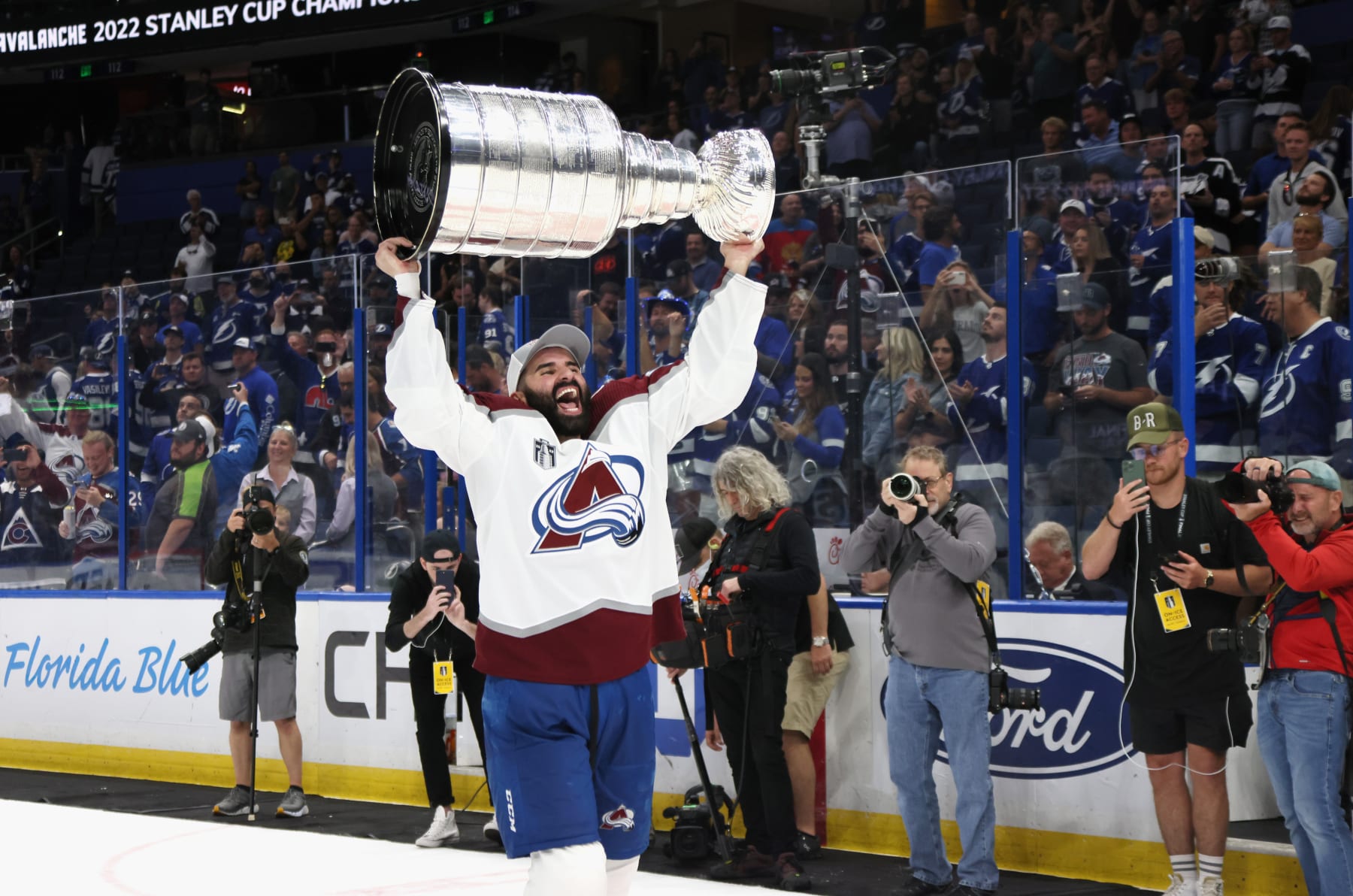 TAMPA, FLORIDA - JUNE 26: Nazem Kadri #91 of the Colorado Avalanche carries the Stanley Cup following the series winning victory over the Tampa Bay Lightning in Game Six of the 2022 NHL Stanley Cup Final at Amalie Arena on June 26, 2022 in Tampa, Florida. (Photo by Bruce Bennett/Getty Images)