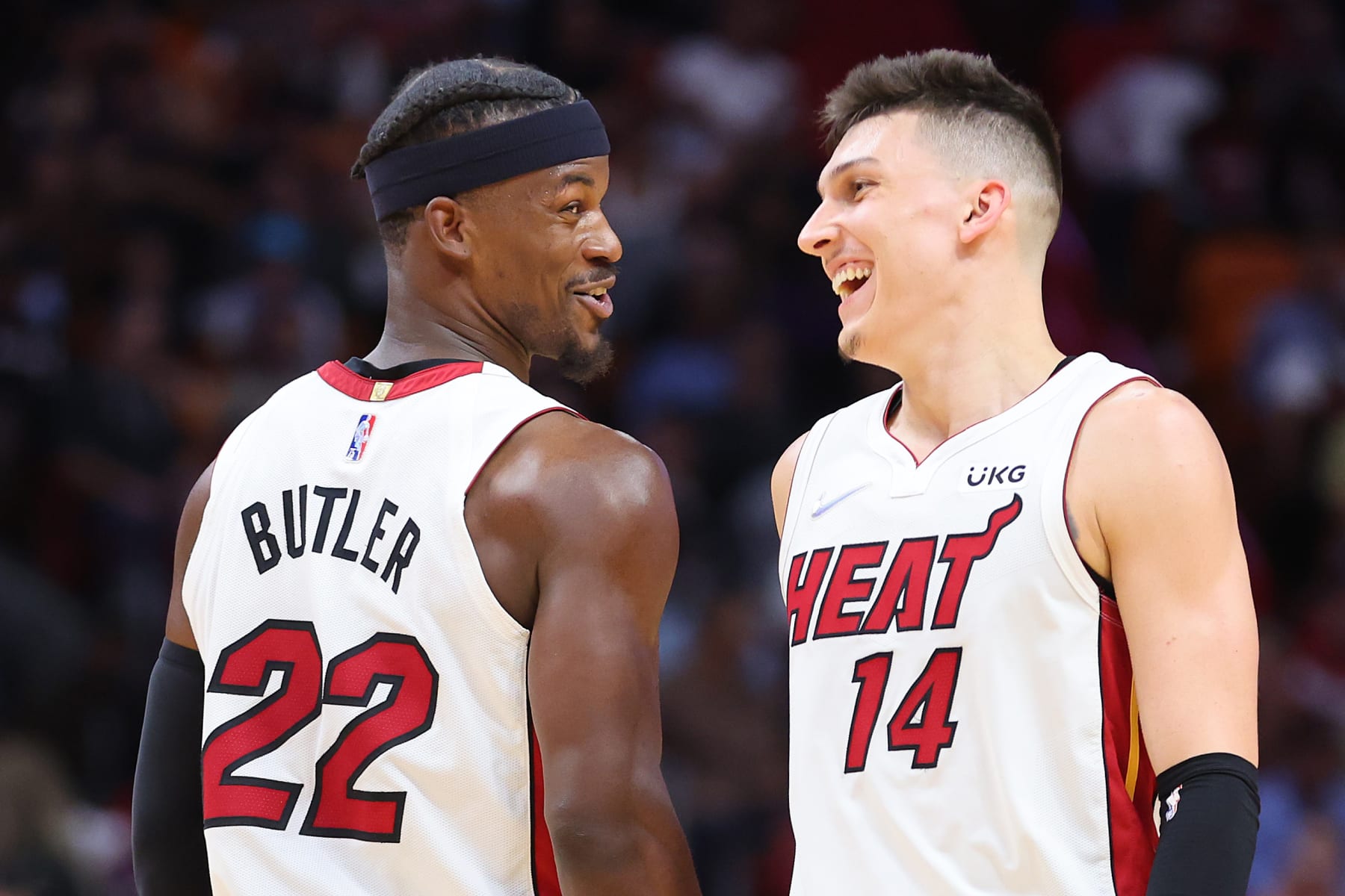 MIAMI, FLORIDA - APRIL 05: Jimmy Butler #22 and Tyler Herro #14 of the Miami Heat celebrate against the Charlotte Hornets during the second half at FTX Arena on April 05, 2022 in Miami, Florida. NOTE TO USER: User expressly acknowledges and agrees that, by downloading and or using this photograph, User is consenting to the terms and conditions of the Getty Images License Agreement. (Photo by Michael Reaves/Getty Images) MIAMI, FLORIDA - APRIL 05: Jimmy Butler #22 and Tyler Herro #14 of the Miami Heat celebrate against the Charlotte Hornets during the second half at FTX Arena on April 05, 2022 in Miami, Florida. NOTE TO USER: User expressly acknowledges and agrees that, by downloading and or using this photograph, User is consenting to the terms and conditions of the Getty Images License Agreement. (Photo by Michael Reaves/Getty Images)