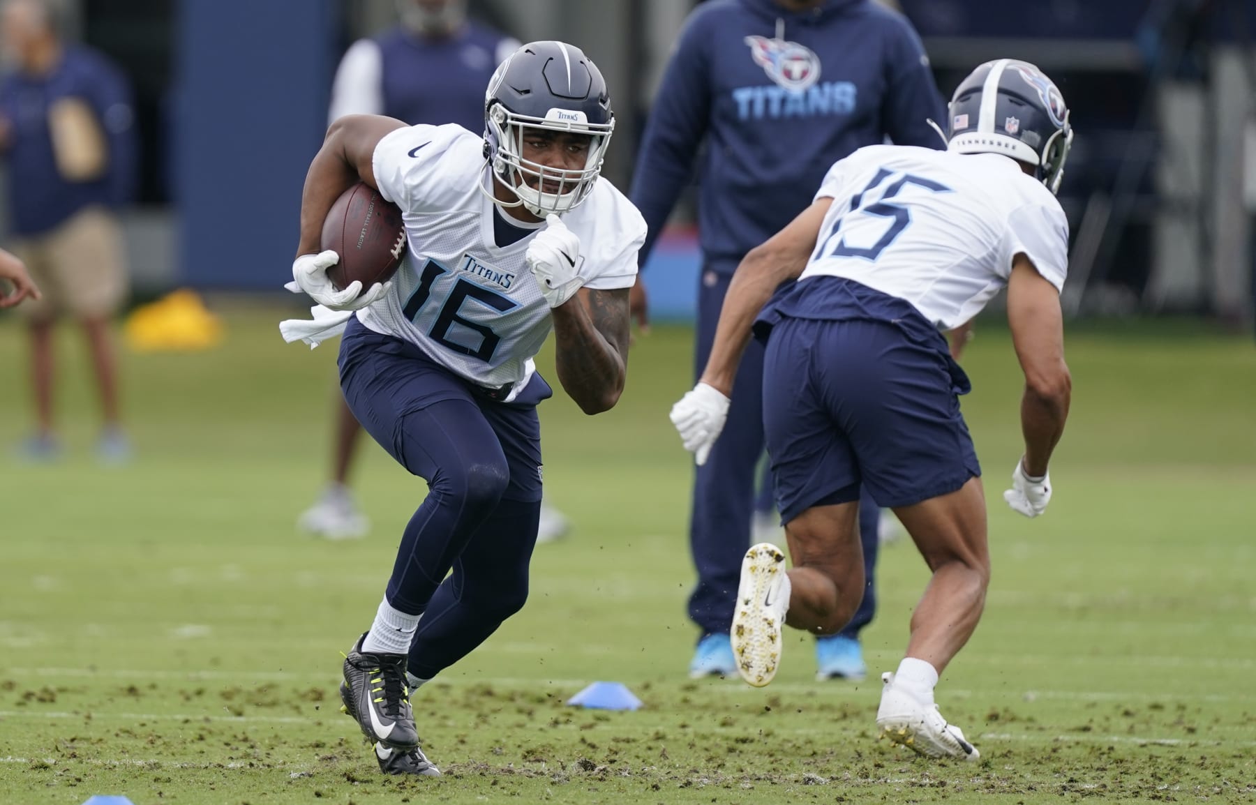 Tennessee Titans wide receiver Treylon Burks (16) takes part in a drill at the NFL football team's practice facility Tuesday, May 24, 2022, in Nashville, Tenn. (AP Photo/Mark Humphrey)