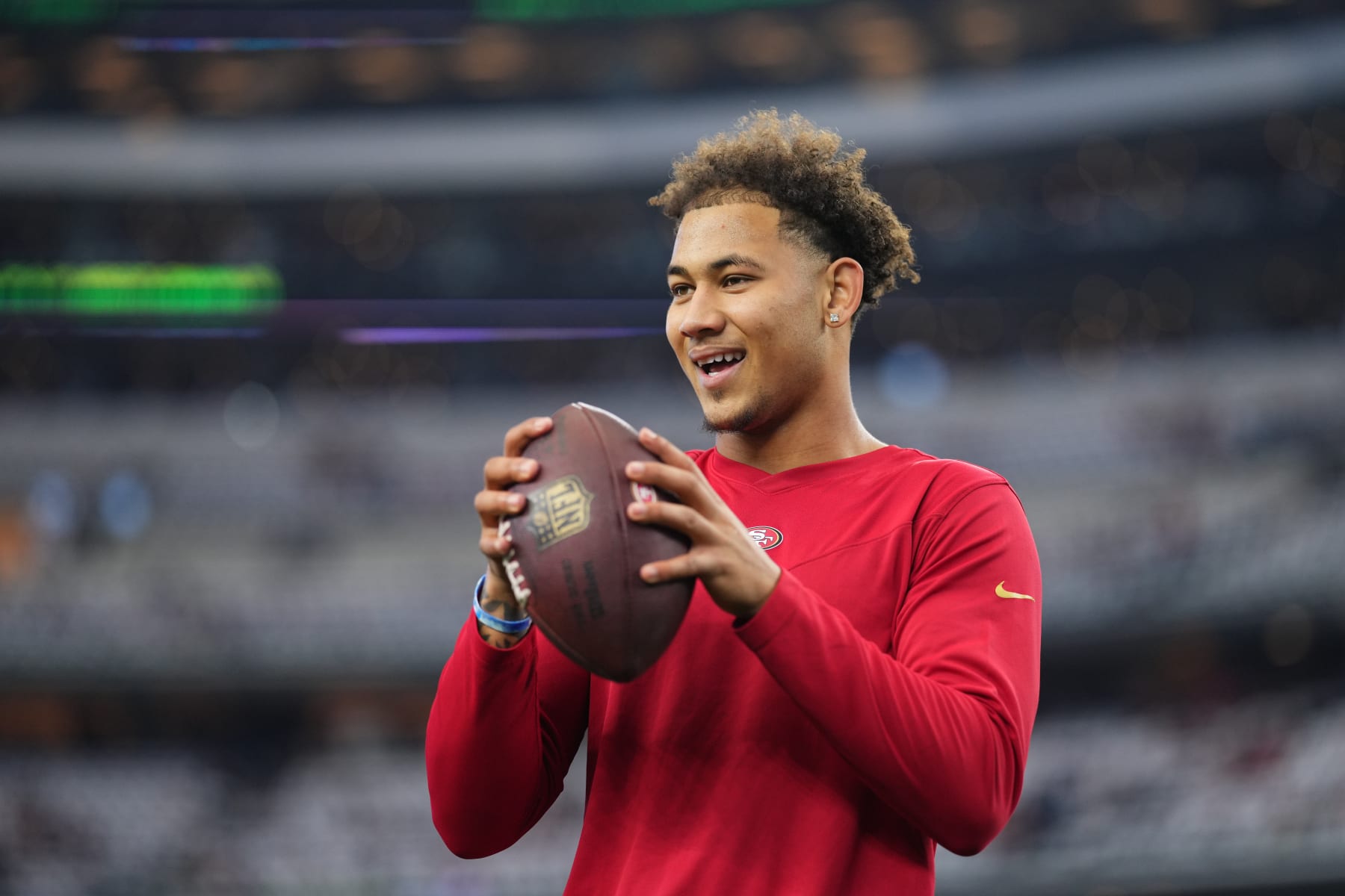 ARLINGTON, TEXAS - JANUARY 16: Trey Lance #5 of the San Francisco 49ers warms up against the Dallas Cowboys prior to an NFL wild-card playoff football game at AT&T Stadium on January 16, 2022 in Arlington, Texas.  (Photo by Cooper Neill/Getty Images)