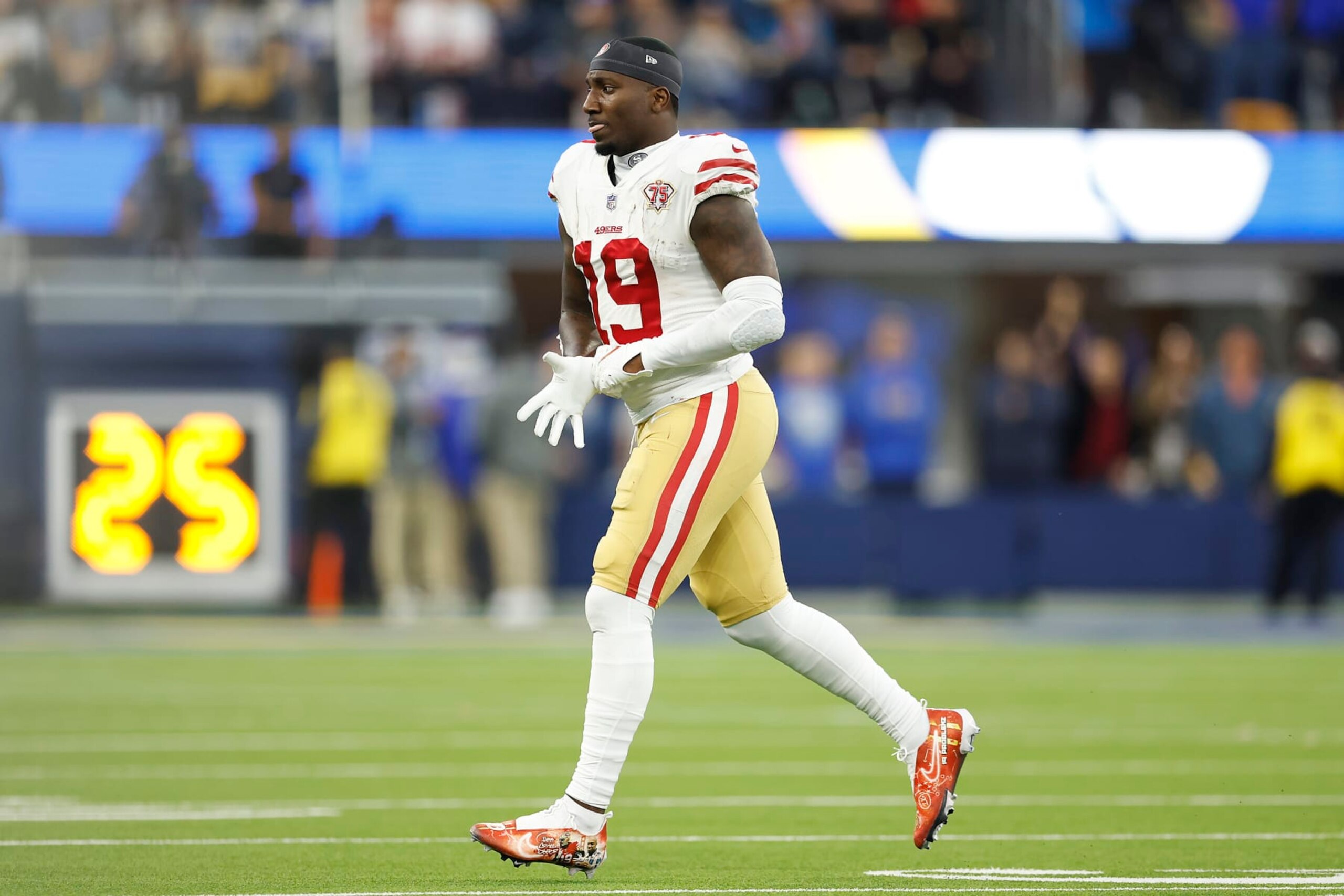 INGLEWOOD, CALIFORNIA - JANUARY 30: Deebo Samuel #19 of the San Francisco 49ers leaves the field after being hit after a catch in the second quarter against the Los Angeles Rams in the NFC Championship Game at SoFi Stadium on January 30, 2022 in Inglewood, California. (Photo by Christian Petersen/Getty Images)