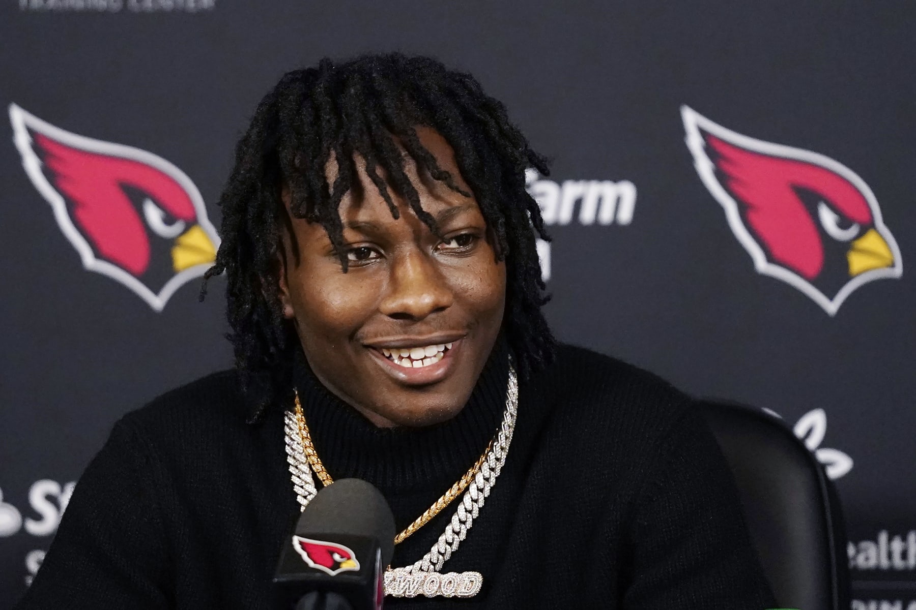 Arizona Cardinals new wide receiver Marquise Brown answers a question at a news conference at the Cardinals NFL football team training facility, Friday, April 29, 2022, in Tempe, Ariz. (AP Photo/Ross D. Franklin)