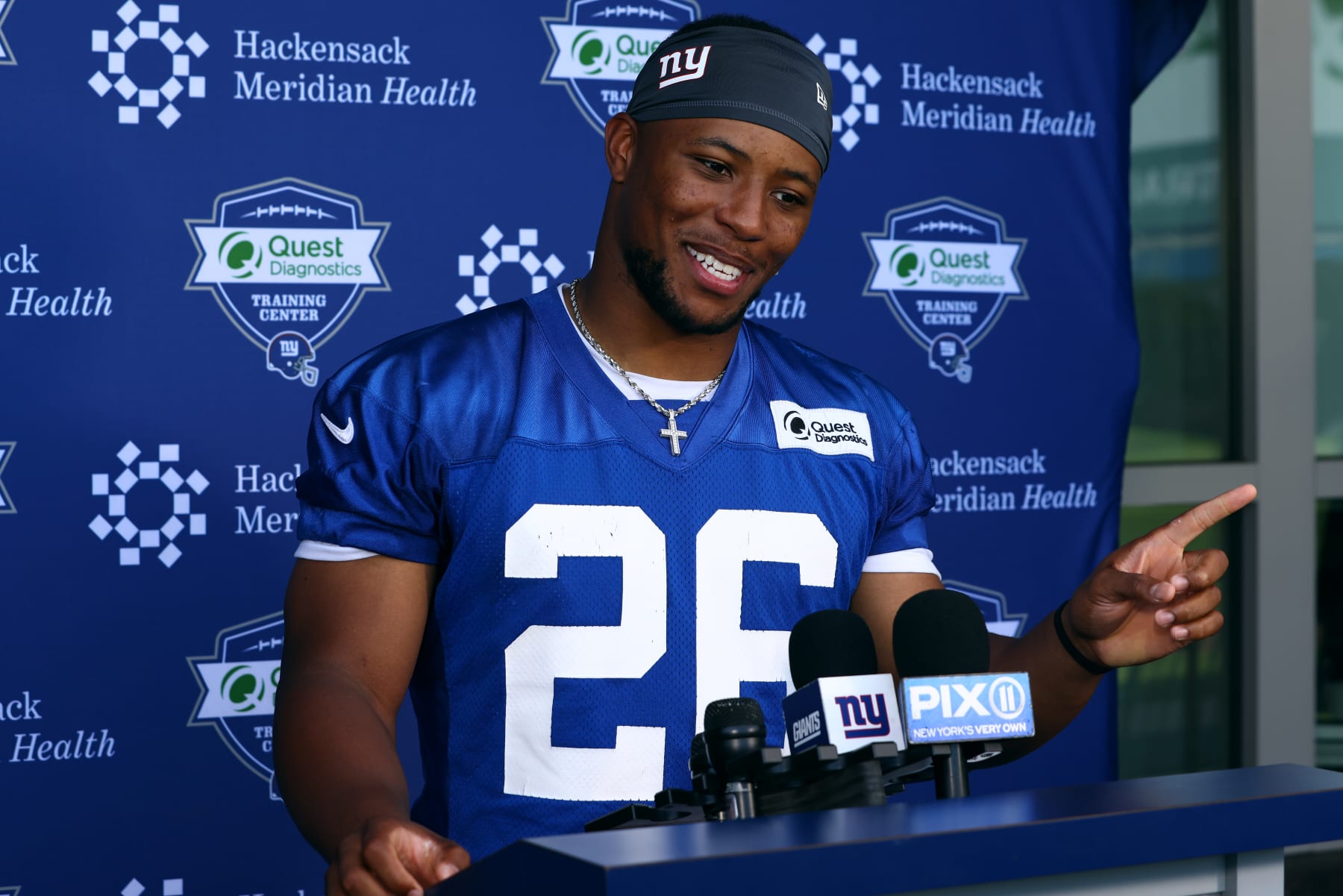 EAST RUTHERFORD, NJ - JUNE 08: Running back Saquon Barkley #26 of the New York Giants talks to the media after mandatory minicamp at Quest Diagnostics Training Center on June 8, 2022 in East Rutherford, New Jersey. (Photo by Rich Schultz/Getty Images)