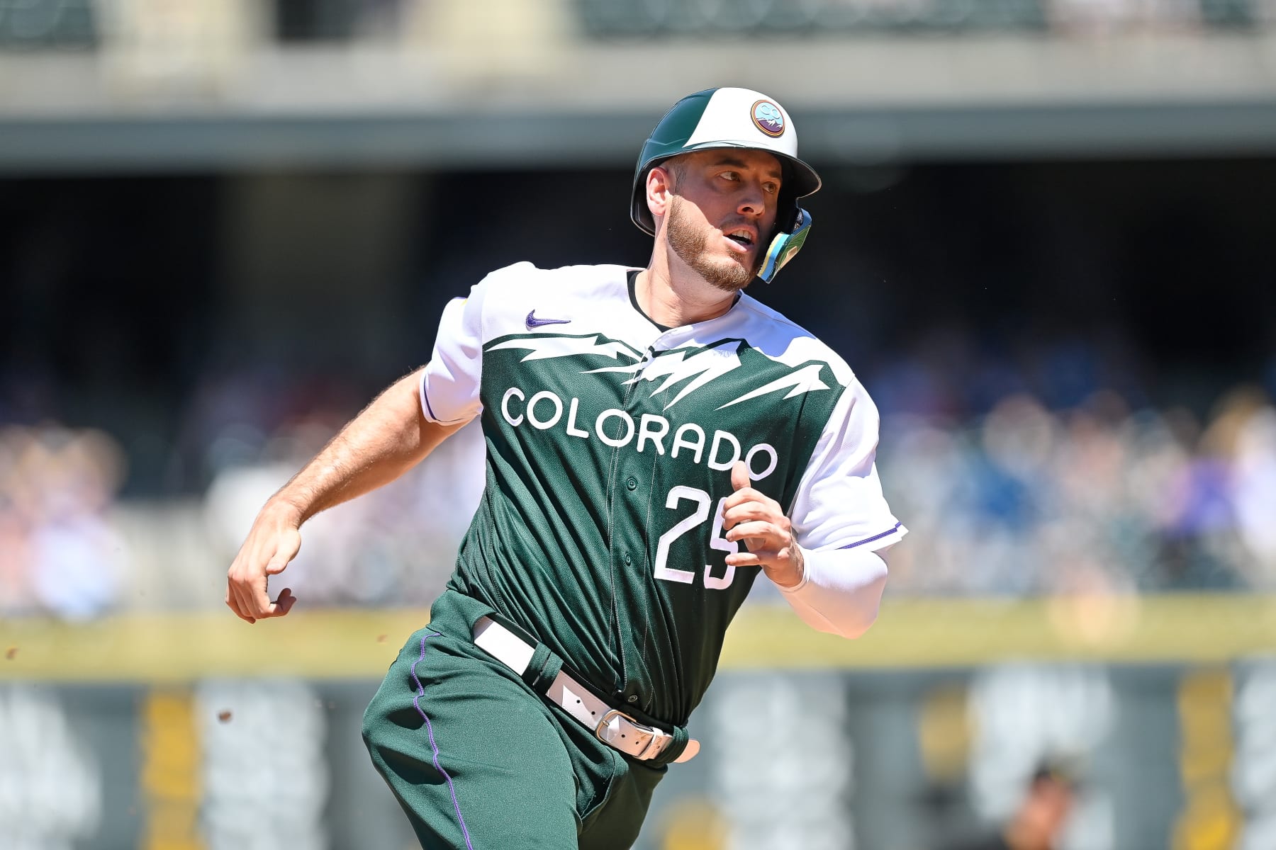 DENVER, CO - JULY 17: Colorado Rockies first baseman C.J. Cron (25) reaches third base during a game between the Pittsburgh Pirates and the Colorado Rockies at Coors Field on July 17, 2022 in Denver, Colorado. (Photo by Dustin Bradford/Icon Sportswire via Getty Images)