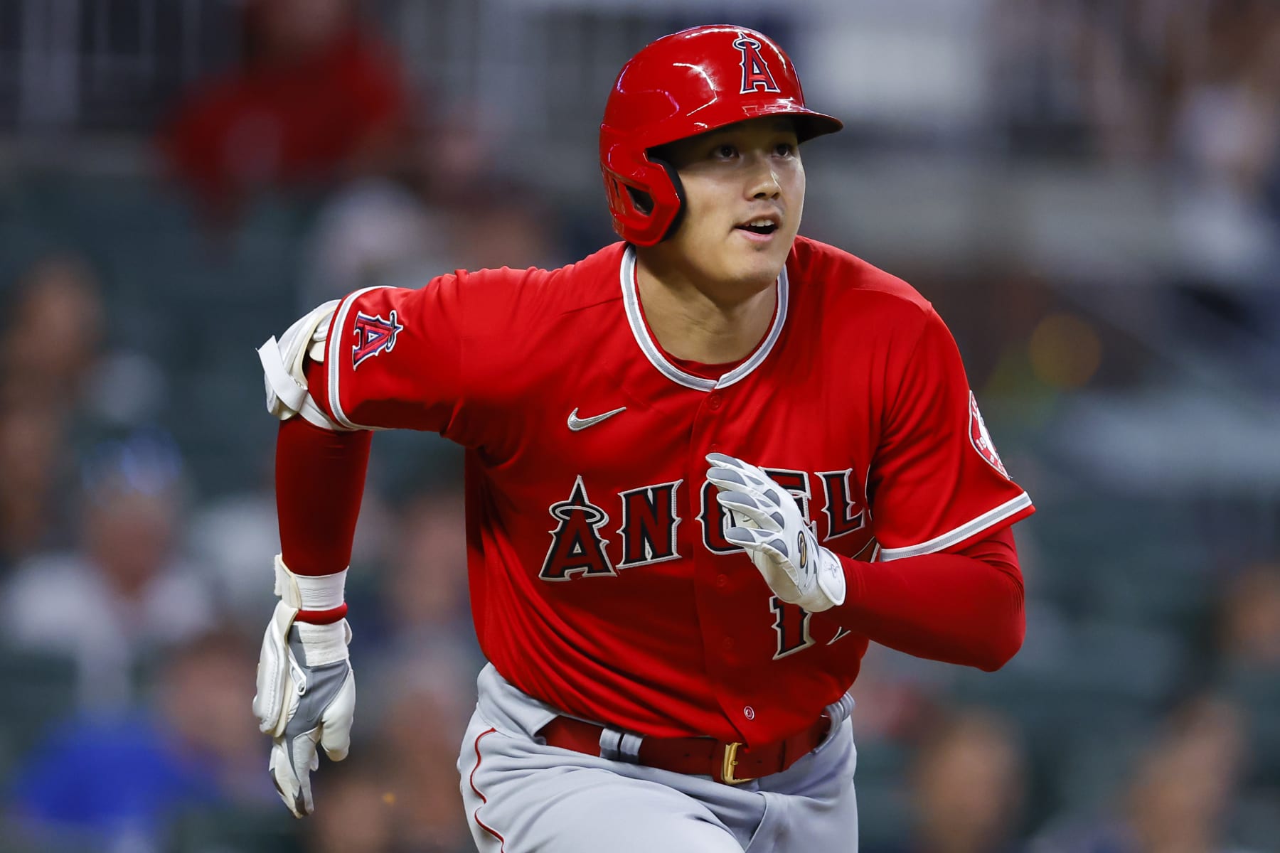 ATLANTA, GA - JULY 23: Shohei Ohtani #17 of the Los Angeles Angels watches the ball as it goes deep for a home run during the fifth inning against the Atlanta Braves at Truist Park on July 23, 2022 in Atlanta, Georgia. (Photo by Todd Kirkland/Getty Images)