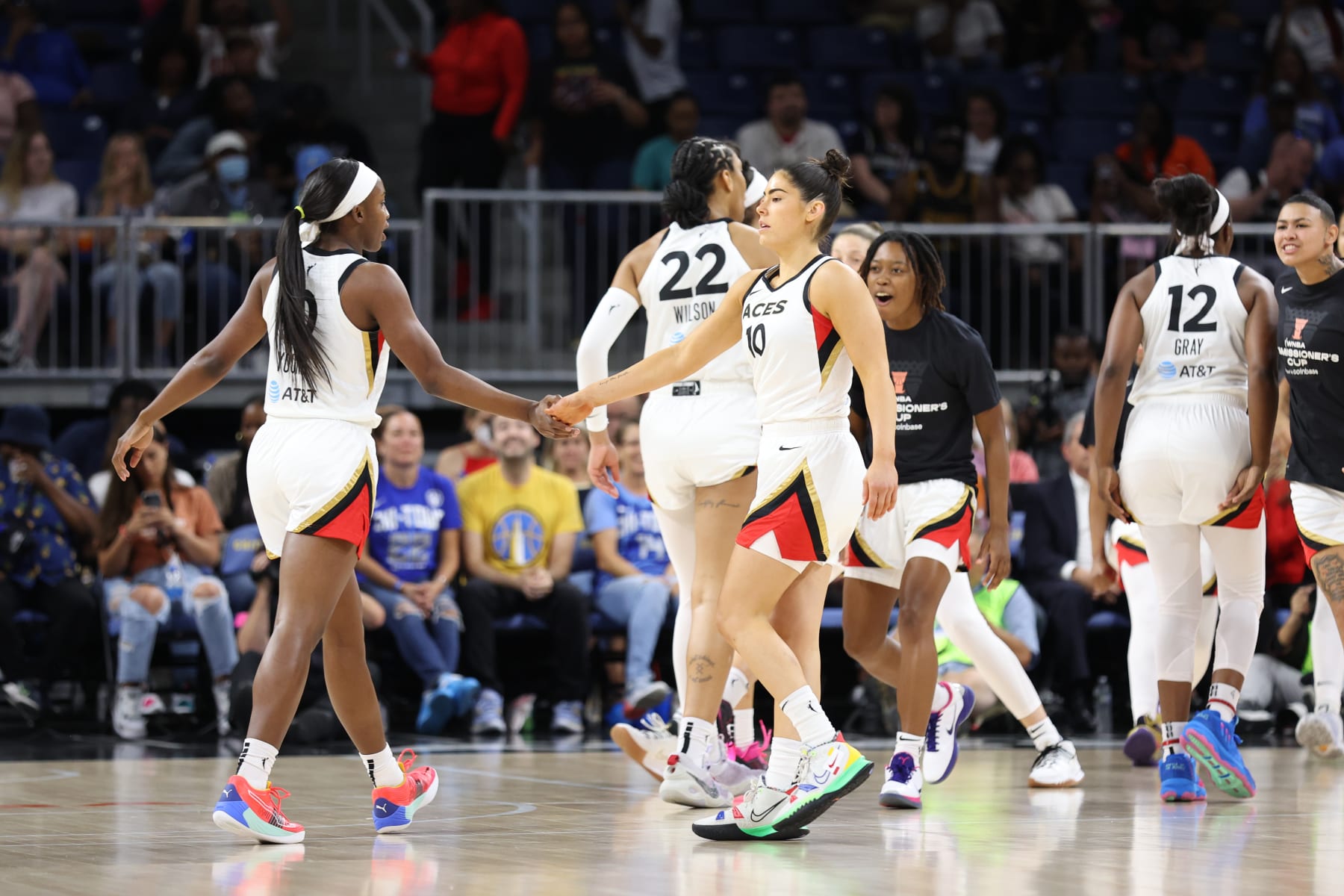 CHICAGO, IL - JULY 26: Jackie Young #0 hi-fives Kelsey Plum #10 of the Las Vegas Aces during the WNBA Commissioner's Cup Game on July 26, 2022 at the Wintrust Arena in Chicago, Illinois. NOTE TO USER: User expressly acknowledges and agrees that, by downloading and or using this photograph, user is consenting to the terms and conditions of the Getty Images License Agreement.  Mandatory Copyright Notice: Copyright 2022 NBAE (Photo by Jeff Haynes/NBAE via Getty Images)