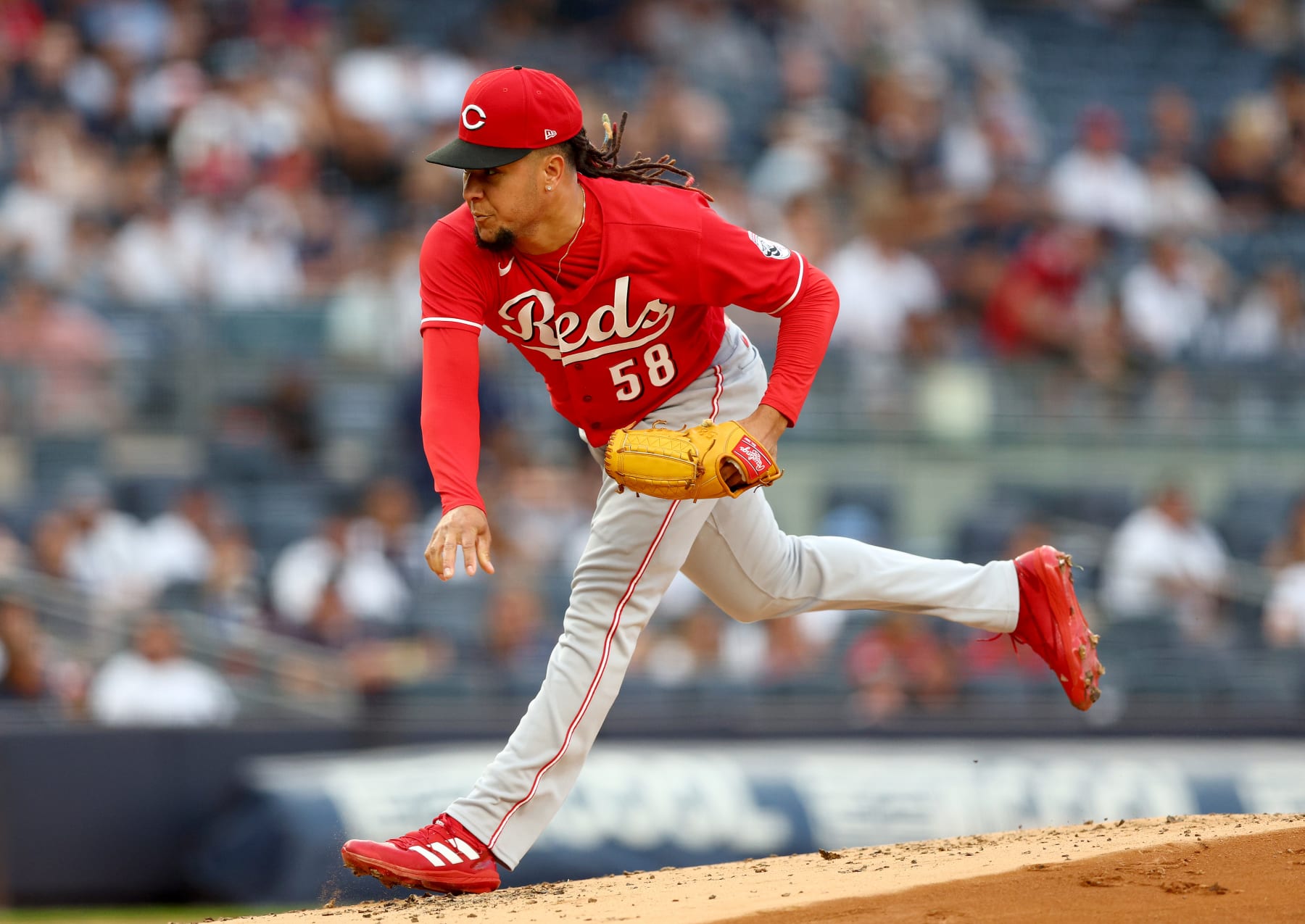 NEW YORK, NEW YORK - JULY 14:  Luis Castillo #58 of the Cincinnati Reds delivers a pitch against the New York Yankees at Yankee Stadium on July 14, 2022 in the Bronx borough of New York City. (Photo by Elsa/Getty Images)