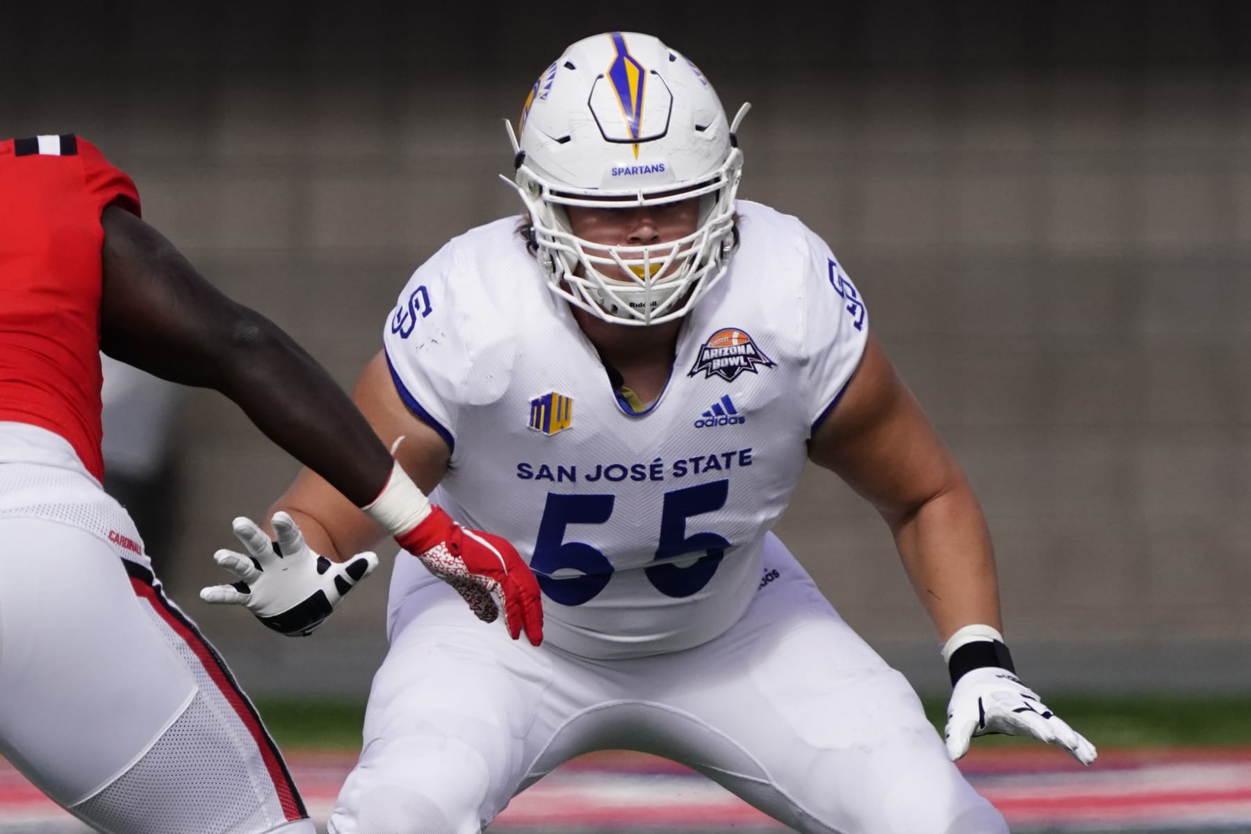 San Jose State offensive tackle Jack Snyder (55) in the first half of the Arizona Bowl NCAA college football game against Ball State, Thursday, Dec. 31, 2020, in Tucson, Ariz. (AP Photo/Rick Scuteri)