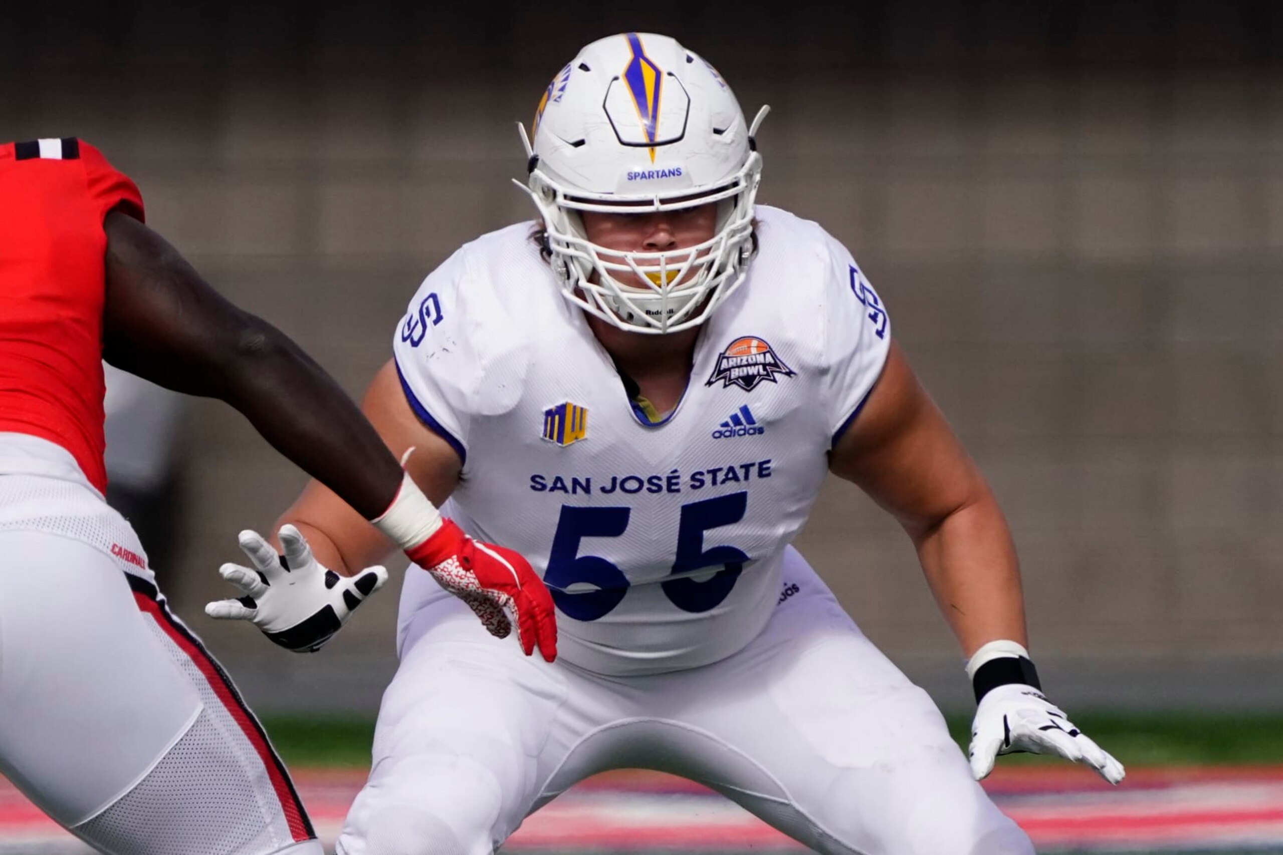San Jose State offensive tackle Jack Snyder (55) in the first half of the Arizona Bowl NCAA college football game against Ball State, Thursday, Dec. 31, 2020, in Tucson, Ariz. (AP Photo/Rick Scuteri)