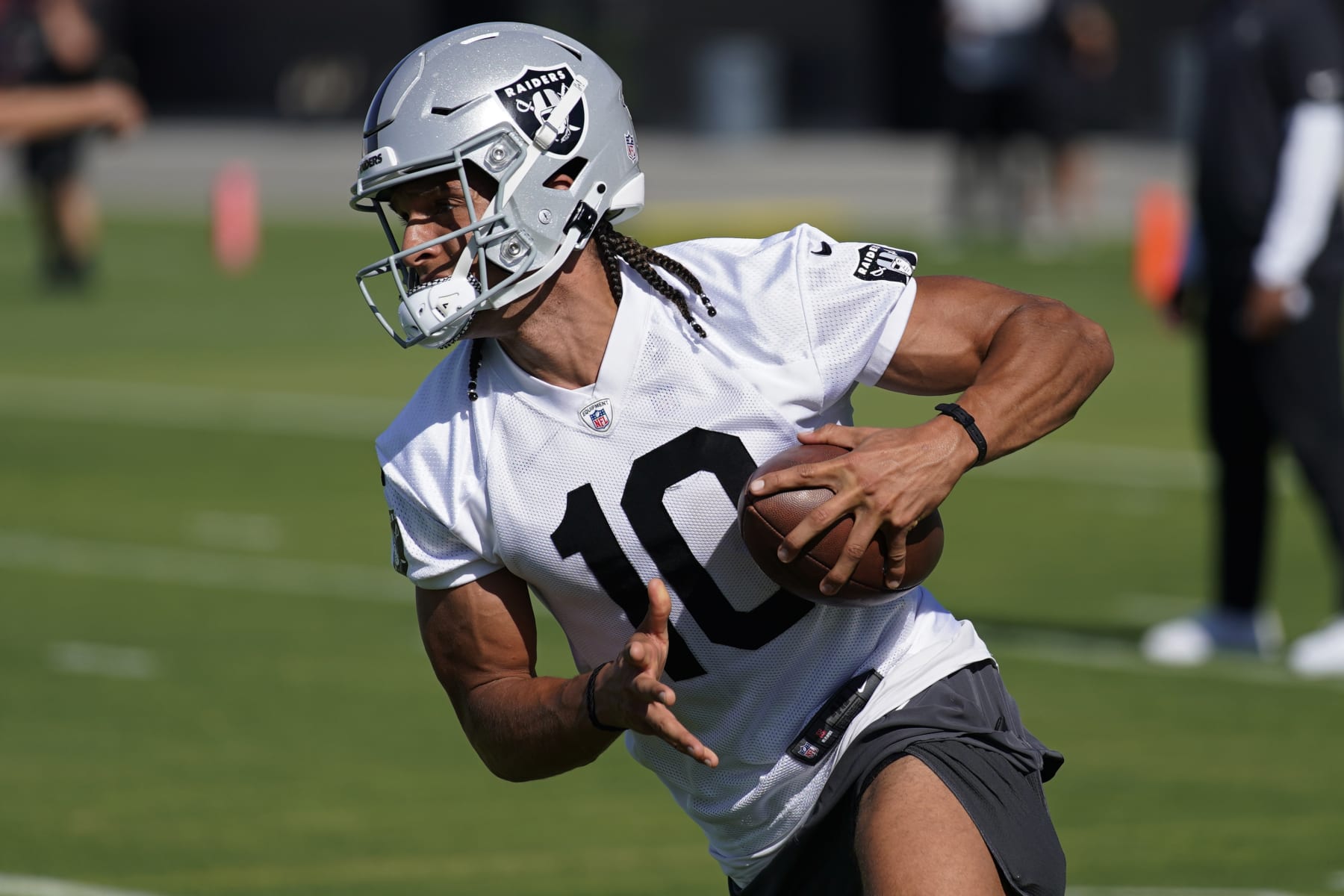 Las Vegas Raiders' Mack Hollins practices during NFL football training camp, Thursday, July 21, 2022, in Henderson, Nev. (AP Photo/John Locher)