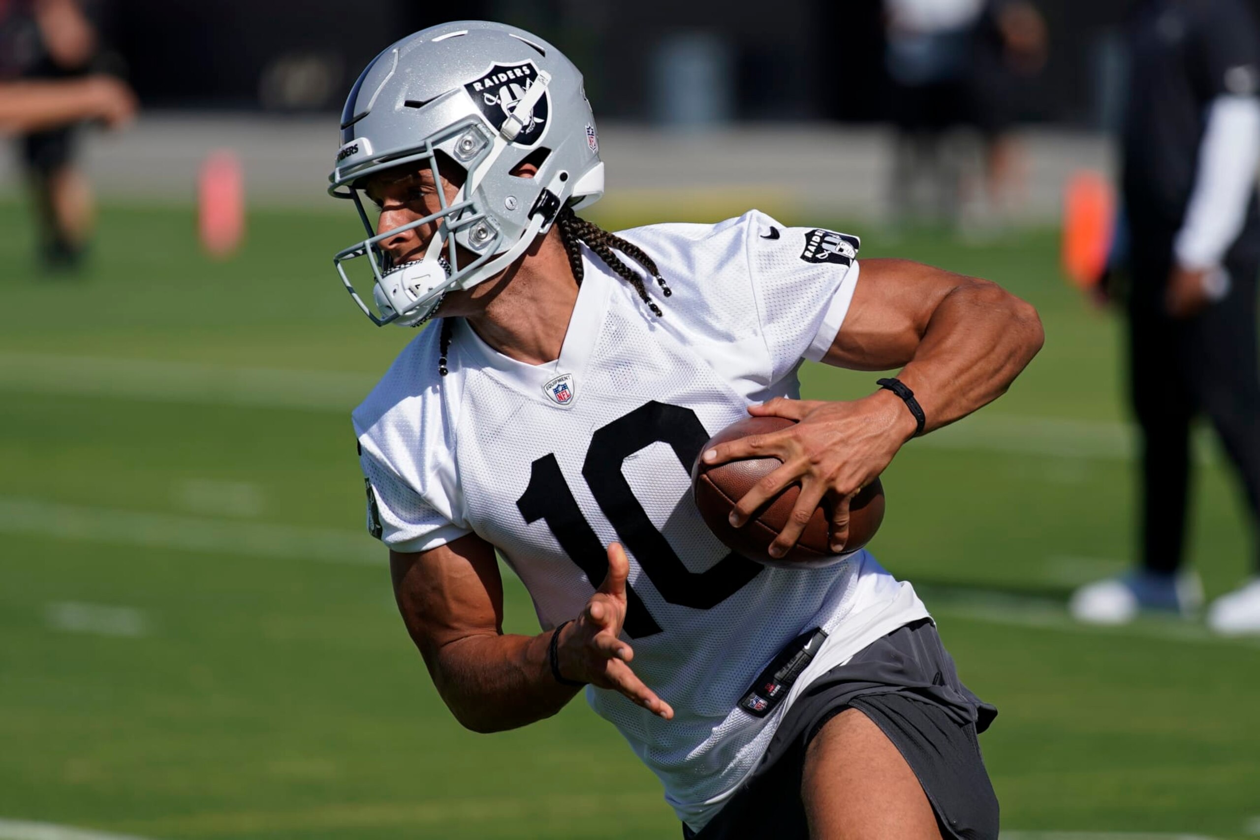 Las Vegas Raiders' Mack Hollins practices during NFL football training camp, Thursday, July 21, 2022, in Henderson, Nev. (AP Photo/John Locher)
