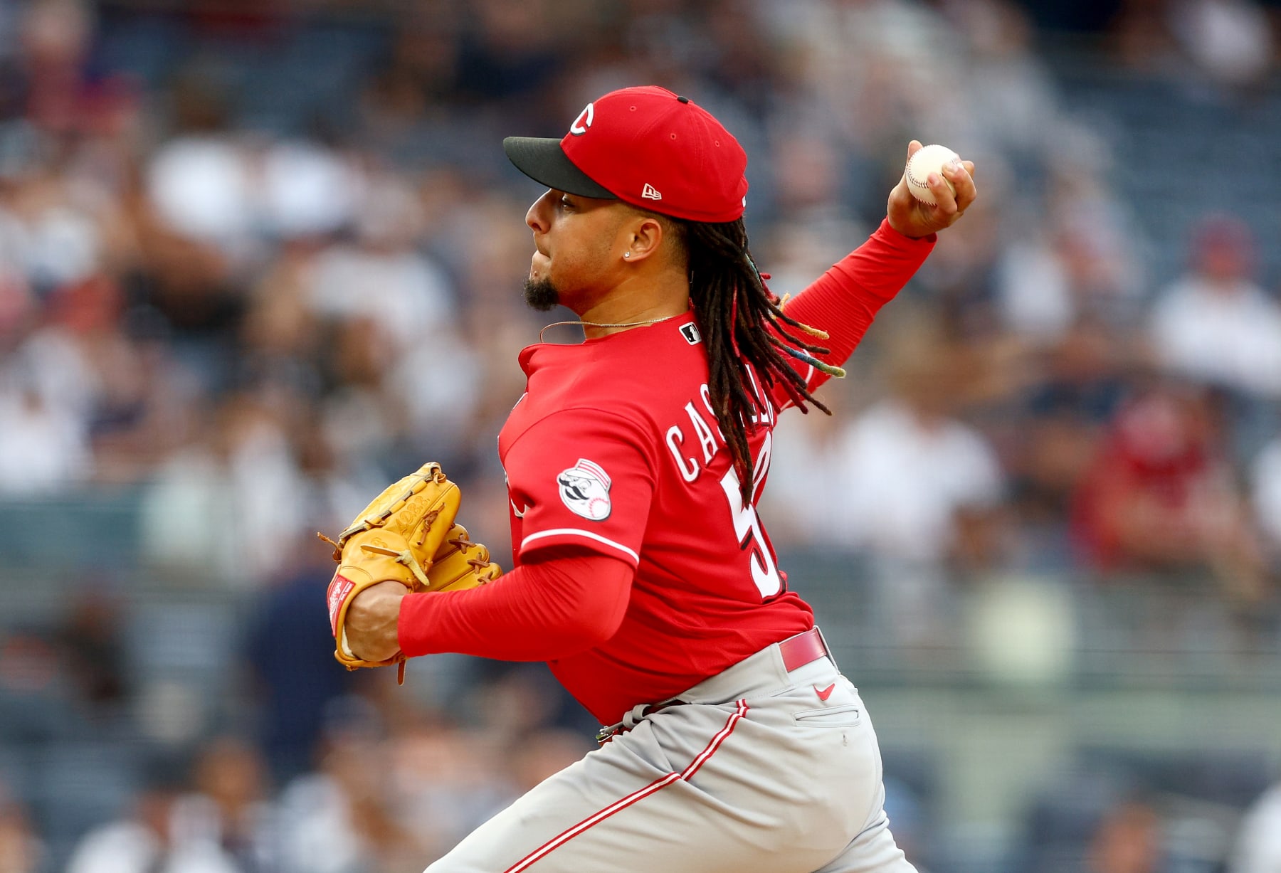 NEW YORK, NEW YORK - JULY 14:  Luis Castillo #58 of the Cincinnati Reds delivers a pitch against the New York Yankees at Yankee Stadium on July 14, 2022 in the Bronx borough of New York City. (Photo by Elsa/Getty Images)