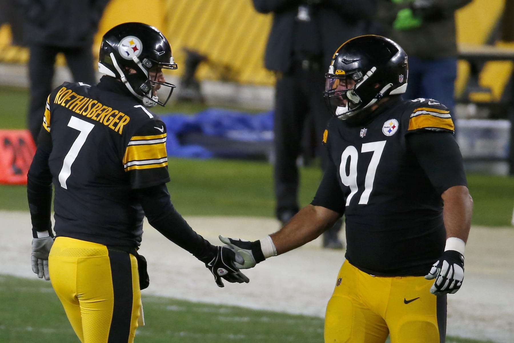 PITTSBURGH, PENNSYLVANIA - DECEMBER 07: Ben Roethlisberger #7 of the Pittsburgh Steelers celebrates with teammate Cameron Heyward #97 following a touchdown pass during the second quarter of their game against the Washington Football Team at Heinz Field on December 07, 2020 in Pittsburgh, Pennsylvania. (Photo by Justin K. Aller/Getty Images)