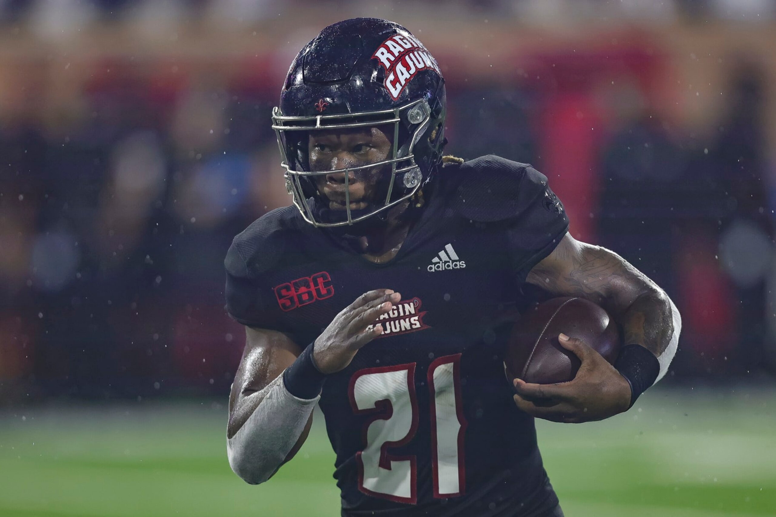 MOBILE, AL - OCTOBER 02: Louisiana-Lafayette Ragin Cajuns running back Chris Smith (21) carries during the college football game between the Louisiana Ragin' Cajuns and the South Alabama Jaguars, on October 2, 2021 at Hancock-Whitney Stadium, Mobile, Alabama. (Photo by Bobby McDuffie/Icon Sportswire via Getty Images)