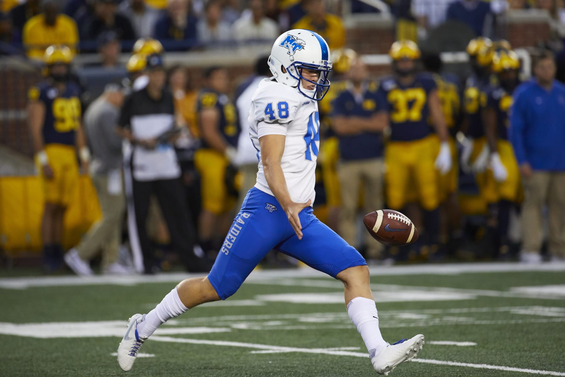 Middle Tennessee punter Kyle Ulbrich (48) during an NCAA football game on Saturday, Aug. 31, 2019 in Ann Arbor, Mich. (AP Photo/Rick Osentoski)