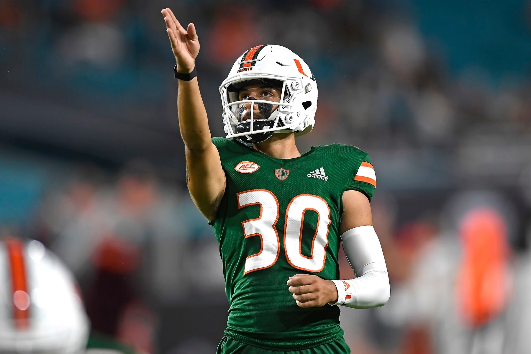 MIAMI GARDENS, FL - NOVEMBER 20:  Miami kicker Andres Borregales (30) lines up an extra point in the first quarter as the University of Miami Hurricanes faced the Virginia Tech Hokies on November 20, 2021, at Hard Rock Stadium in Miami Gardens, Florida. (Photo by Samuel Lewis/Icon Sportswire via Getty Images)