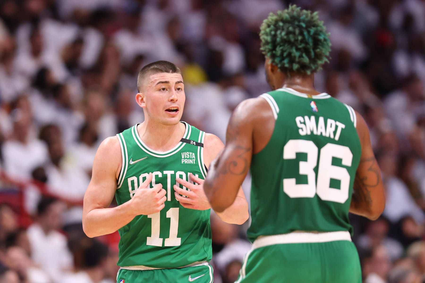 MIAMI, FLORIDA - MAY 19: Payton Pritchard #11 of the Boston Celtics talks with Marcus Smart #36 against the Miami Heat in Game Two of the 2022 NBA Playoffs Eastern Conference Finals at FTX Arena on May 19, 2022 in Miami, Florida. NOTE TO USER: User expressly acknowledges and agrees that, by downloading and or using this photograph, User is consenting to the terms and conditions of the Getty Images License Agreement. (Photo by Michael Reaves/Getty Images) MIAMI, FLORIDA - MAY 19: Payton Pritchard #11 of the Boston Celtics talks with Marcus Smart #36 against the Miami Heat in Game Two of the 2022 NBA Playoffs Eastern Conference Finals at FTX Arena on May 19, 2022 in Miami, Florida. NOTE TO USER: User expressly acknowledges and agrees that, by downloading and or using this photograph, User is consenting to the terms and conditions of the Getty Images License Agreement. (Photo by Michael Reaves/Getty Images)