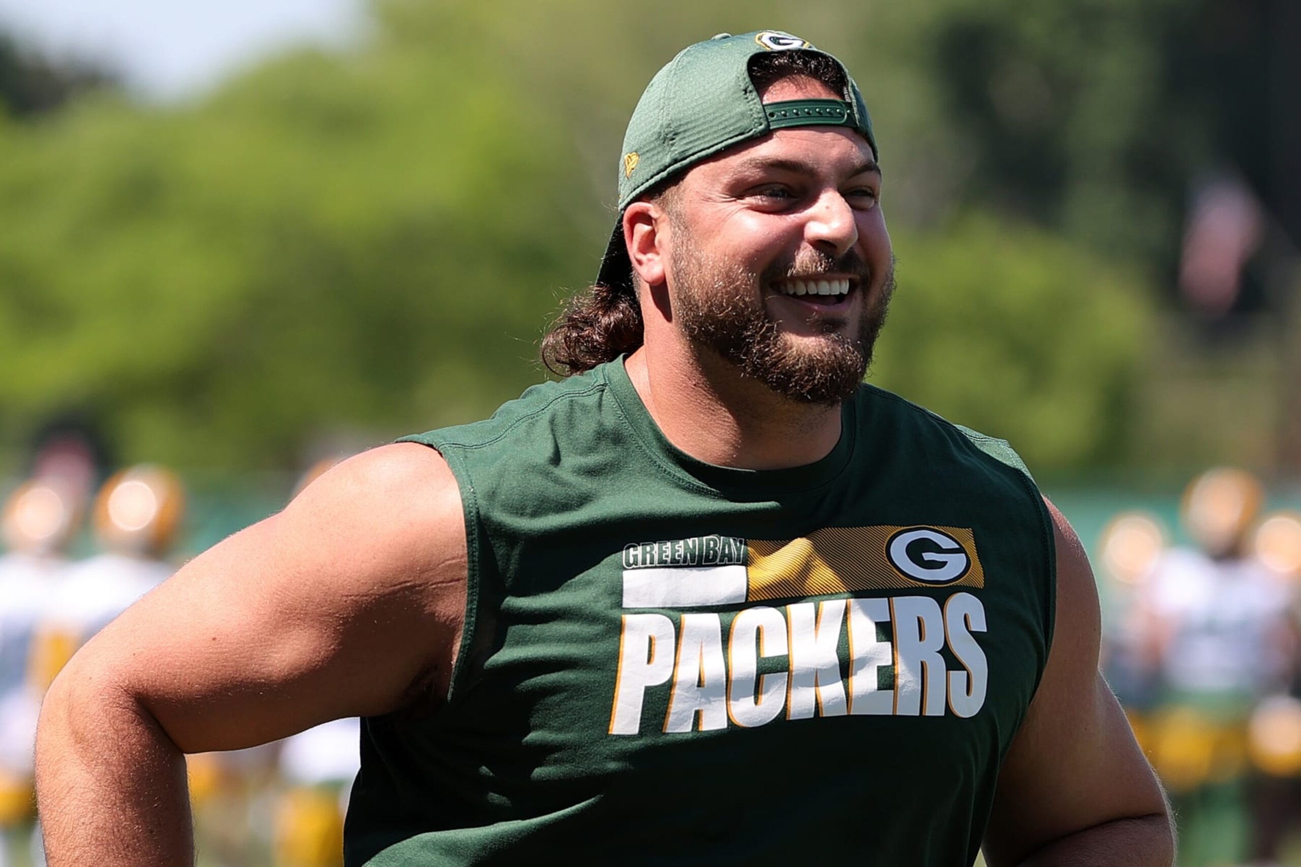 ASHWAUBENON, WISCONSIN - JUNE 08: David Bakhtiari #69 of the Green Bay Packers works out during training camp at Ray Nitschke Field on June 08, 2021 in Ashwaubenon, Wisconsin. (Photo by Stacy Revere/Getty Images)