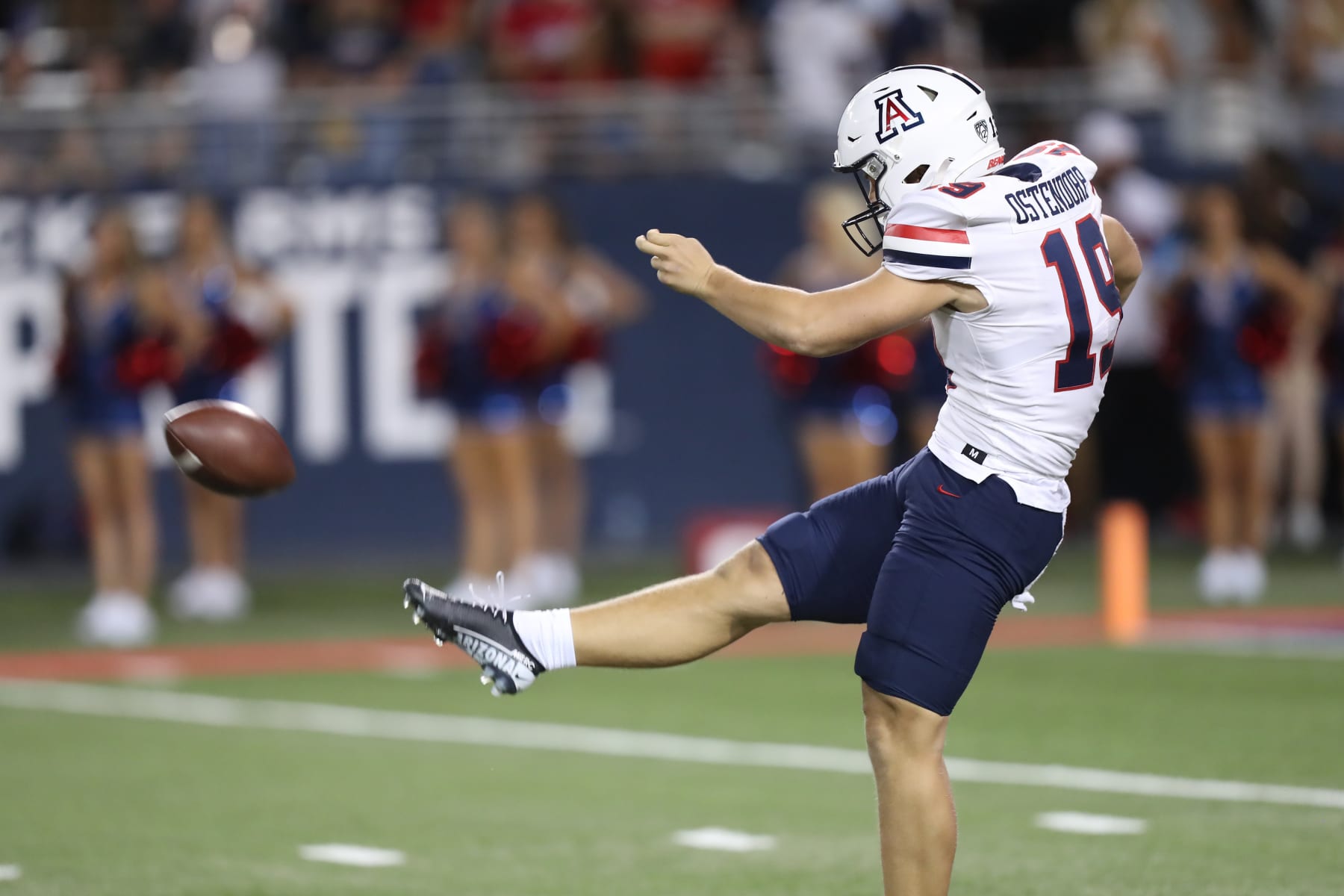 TUCSON, AZ - SEPTEMBER 18: University of Arizona punter #19 Kyle Ostendorp punts in the first half during a college football game between the Northern Arizona University Lumberjacks and the University of Arizona Wildcats on September 18, 2021 at Arizona Stadium in Tucson, AZ.  (Photo by Christopher Hook/Icon Sportswire via Getty Images)