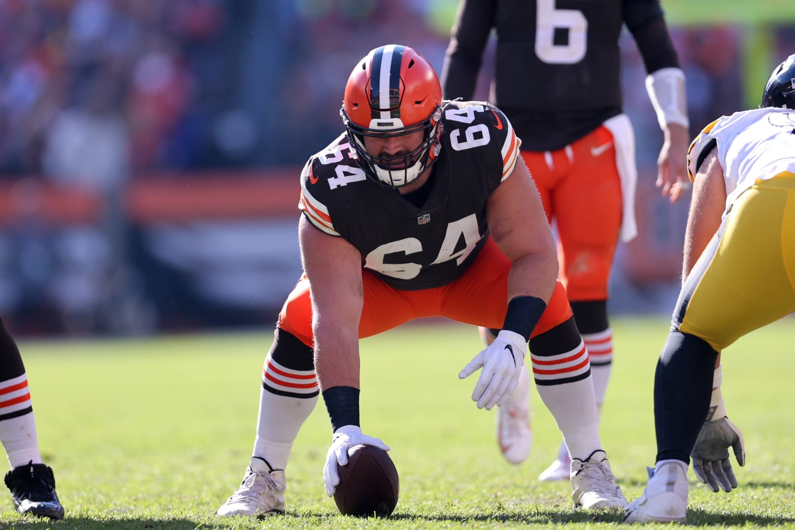 CLEVELAND, OH - OCTOBER 31: Cleveland Browns center JC Tretter (64) prepares to snap the football during the third quarter of the National Football League game between the Pittsburgh Steelers and Cleveland Browns on October 31, 2021, at FirstEnergy Stadium in Cleveland, OH. (Photo by Frank Jansky/Icon Sportswire via Getty Images)